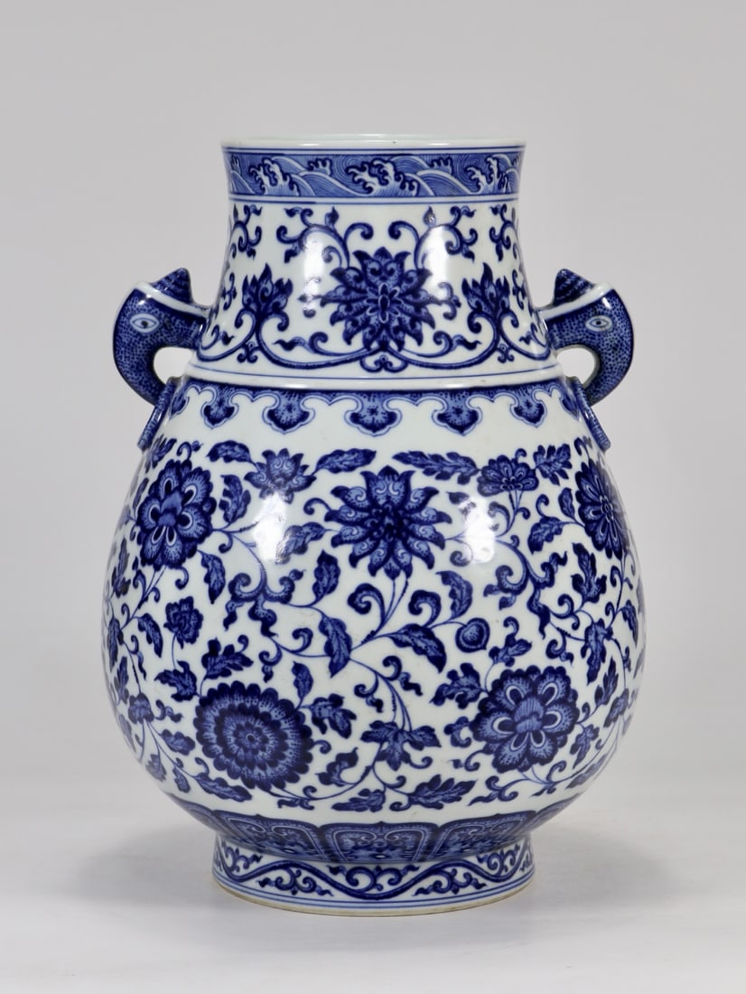 An Exquisite Blue and White Lotus Pattern Double-Ears Vase: An Exquisite Blue and White Lotus Pattern Double-Ears Vase Qing Dynasty, China Qianlong Six-character Mark Size:13inx5.1in青花缠枝花卉图纹福ੲ