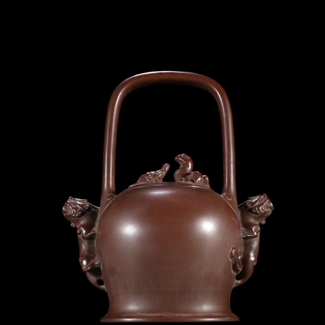 An Exquisite Purple Sands Auspicious Beast Pattern Ewer: An Exquisite Purple Sands Auspicious Beast Pattern Ewer Dong qi chang Size:8.3inx6.7in紫泥瑞兽双嘴提梁壶 董其昌 Size:21cmx17cm
