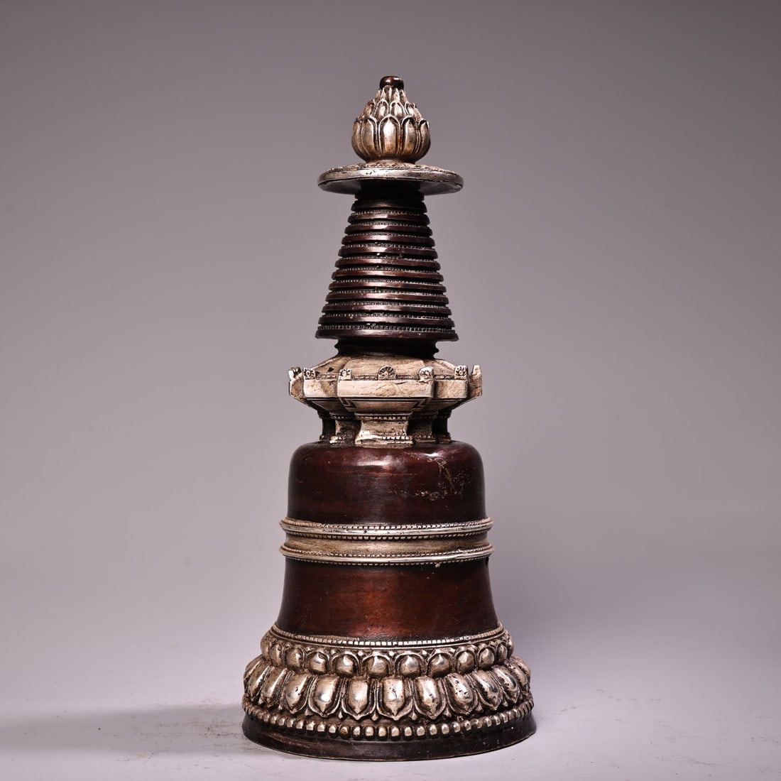 An Exquisite Silver Bronze Pagoda: An Exquisite Silver Bronze Pagoda Qing Dynasty, China Size:6.7inx3in Weight:500g铜鎏银佛塔 中国清代 Size:17cmx7.5cm Weight:500g