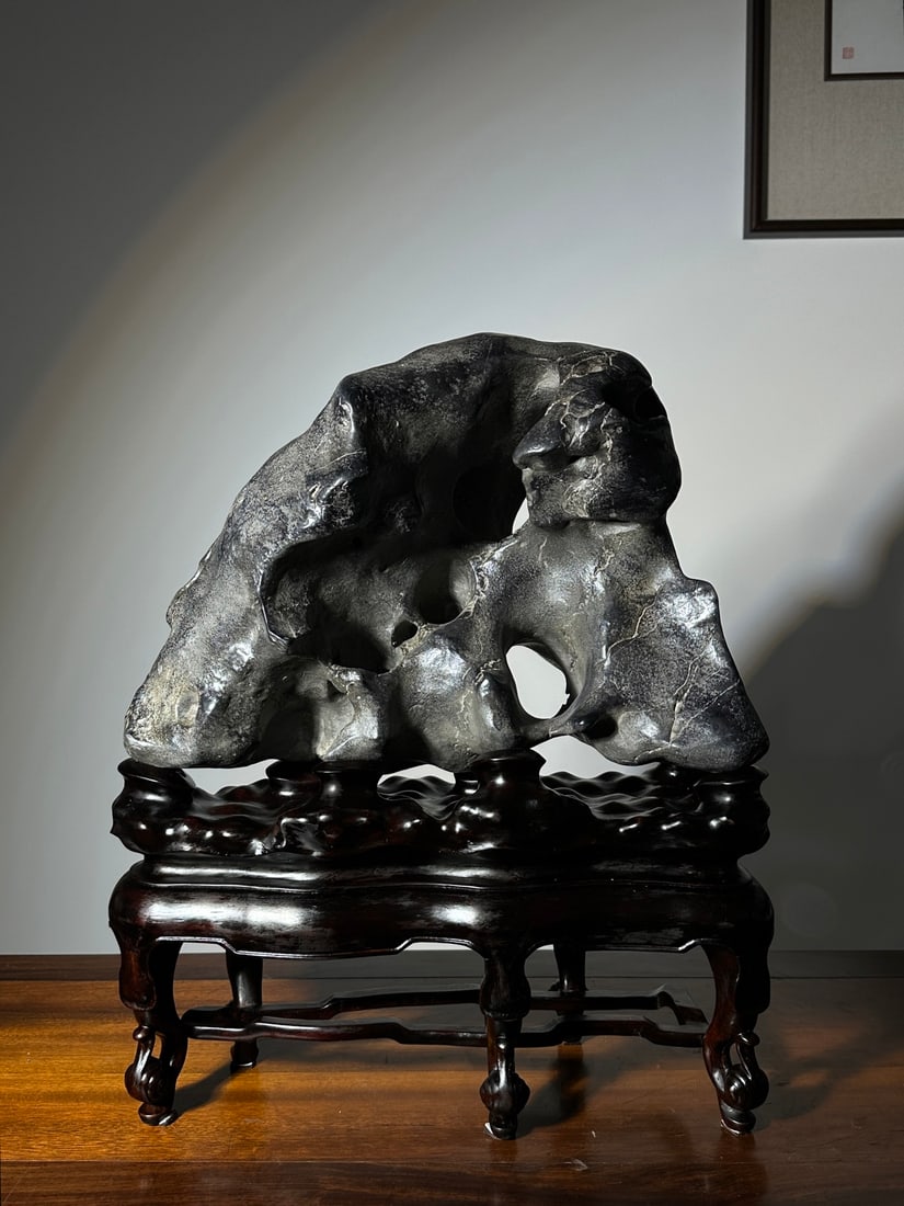 An Exquisite Taihu Stone Ornament: An Exquisite Taihu Stone Ornament Qing Dynasty, China Size:20.5inx17.3inx7.9in太湖石摆件 中国清代 Size:52cmx44cmx20cm