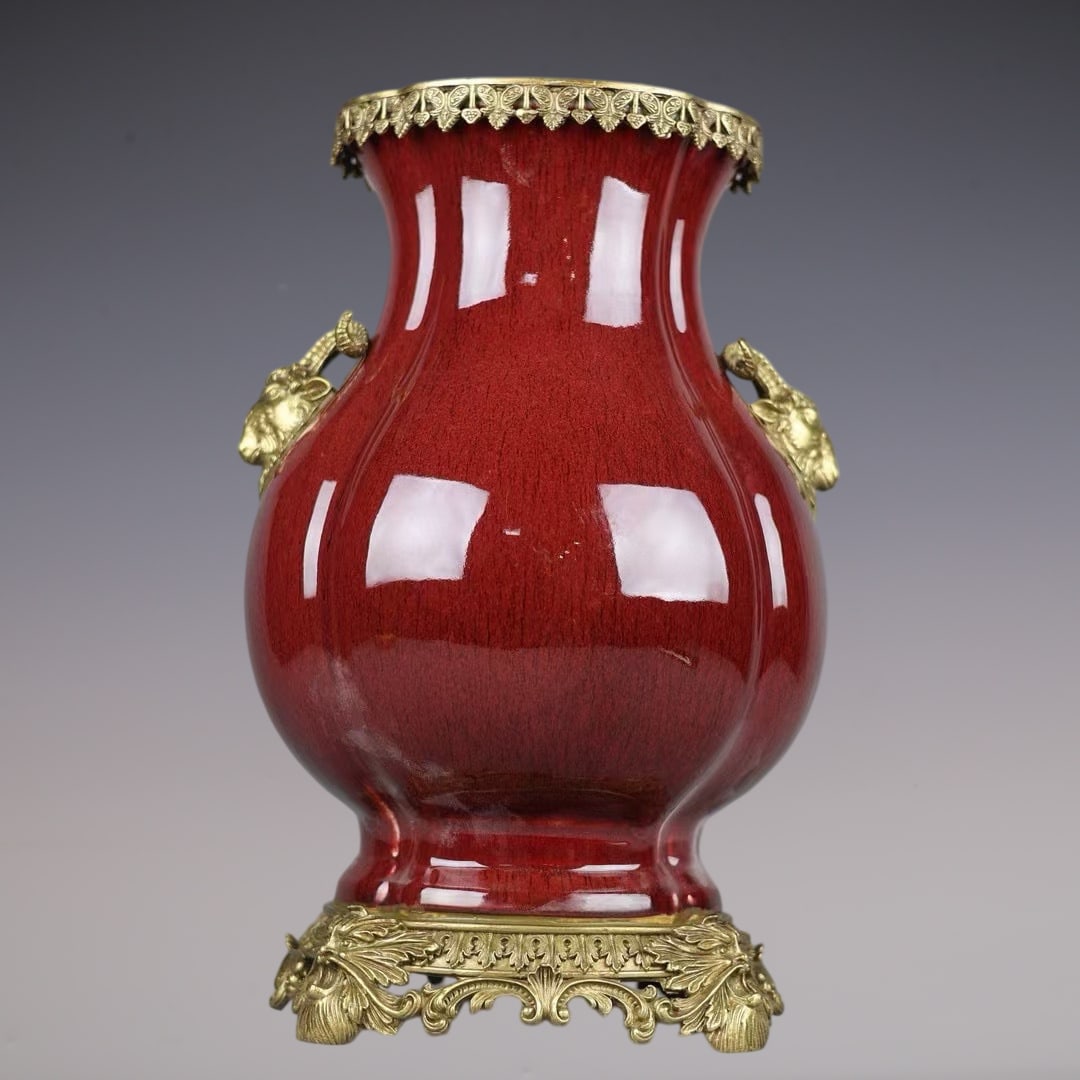 An Exquisite Iron-Red Inlaid Bronze Double-Ears Vase: An Exquisite Iron-Red Inlaid Bronze Double-Ears Vase Qing Dynasty, China Yongzheng Six-character Mark Size:16.1inx10.6in矾红釉镶铜羊耳尊
