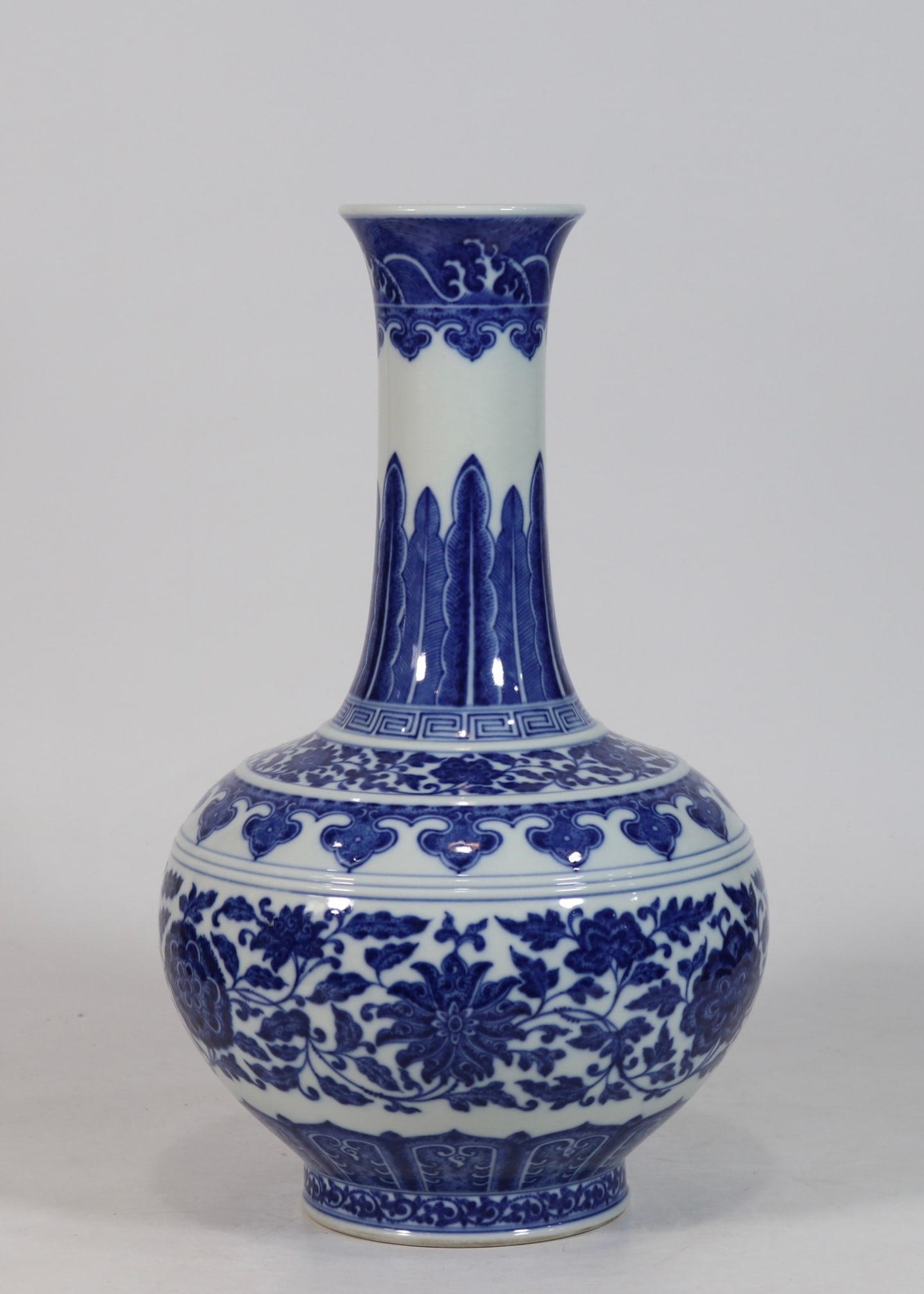 An Exquisite Blue and White Lotus Pattern Vase: An Exquisite Blue and White Lotus Pattern Vase Qing Dynasty, China Qianlong Six-character Mark Size:15.4inx8.9in青花缠枝花卉赏瓶