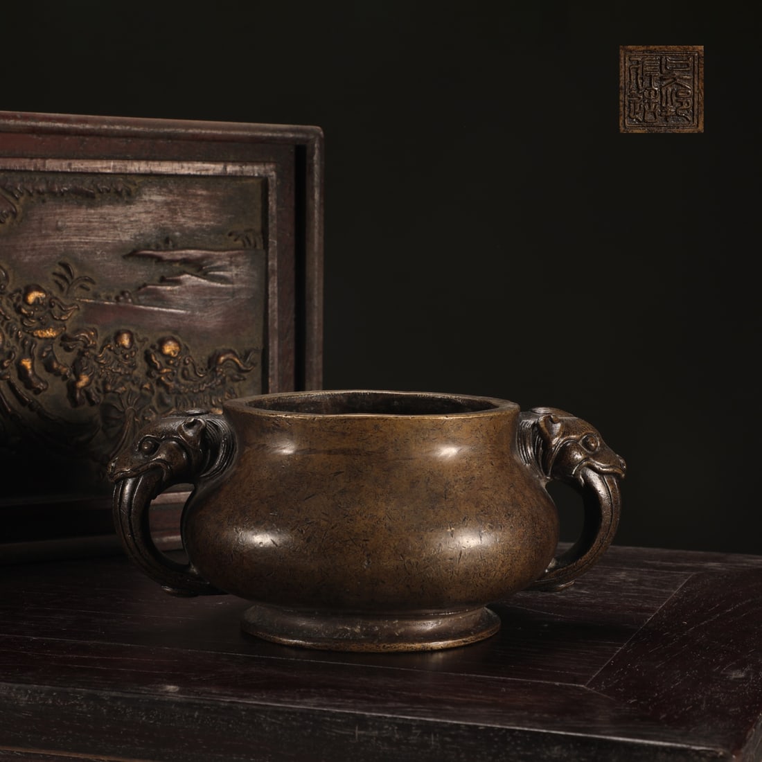 An Exquisite Bronze Double-Ears Censer: An Exquisite Bronze Double-Ears Censer Ming Dynasty, China Size:3.1inx5.4in Weight:1400g铜龙首耳炉 中国明代 Size:8cmx13.7cm Weight:1400g