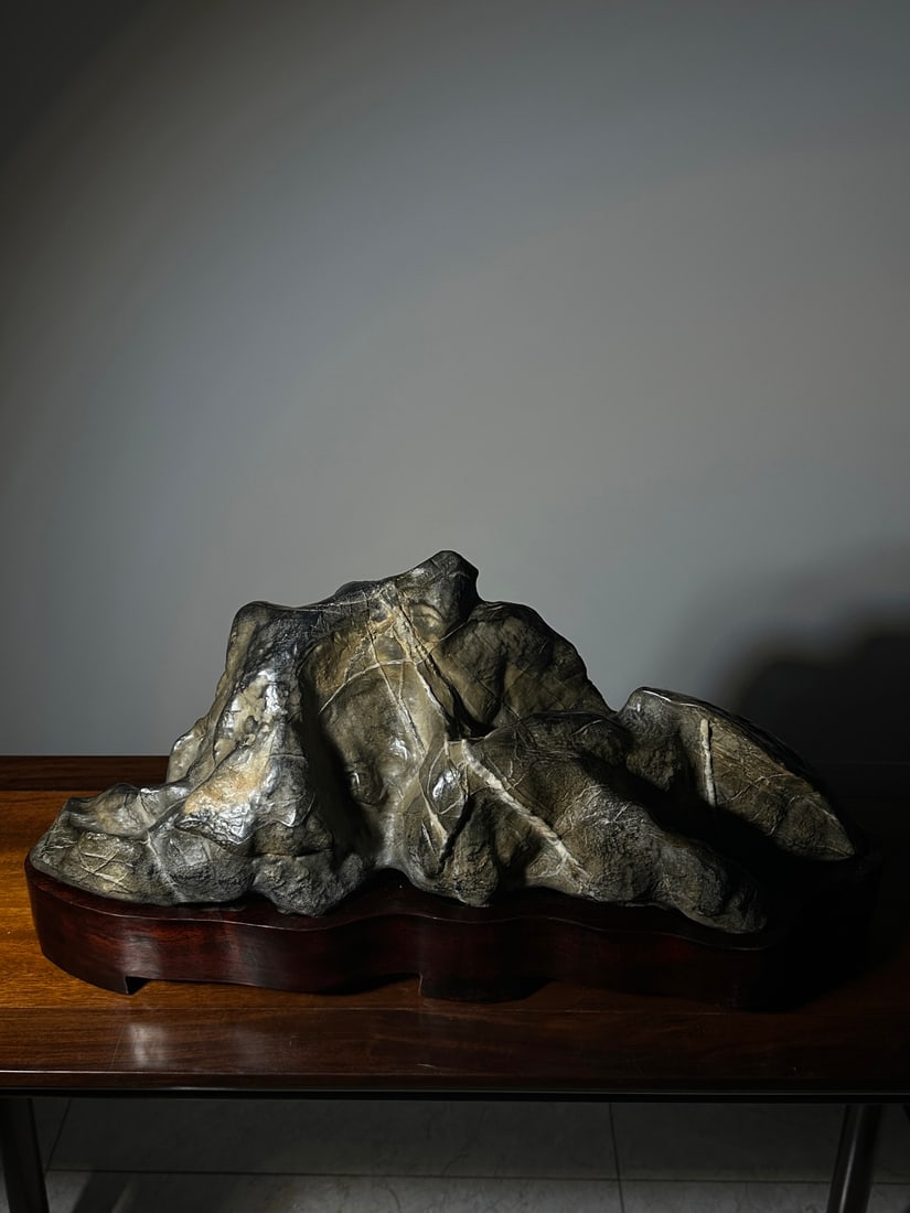 An Exquisite Lingbi Stone ?Ornament: An Exquisite Lingbi Stone ?Ornament Qing Dynasty, China Size:26.8inx12.6inx12.2in灵璧石山摆件 中国清代 Size:68cmx32cmx31cm