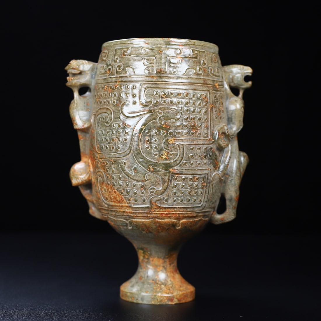 An Exquisite White Jade Chi-Dragon Pattern Cup: An Exquisite White Jade Chi-Dragon Pattern Cup Han Dynasty, China Size:5.7inx4.7inx3.2in Weight:484.5g白玉双螭龙杯 中国汉代