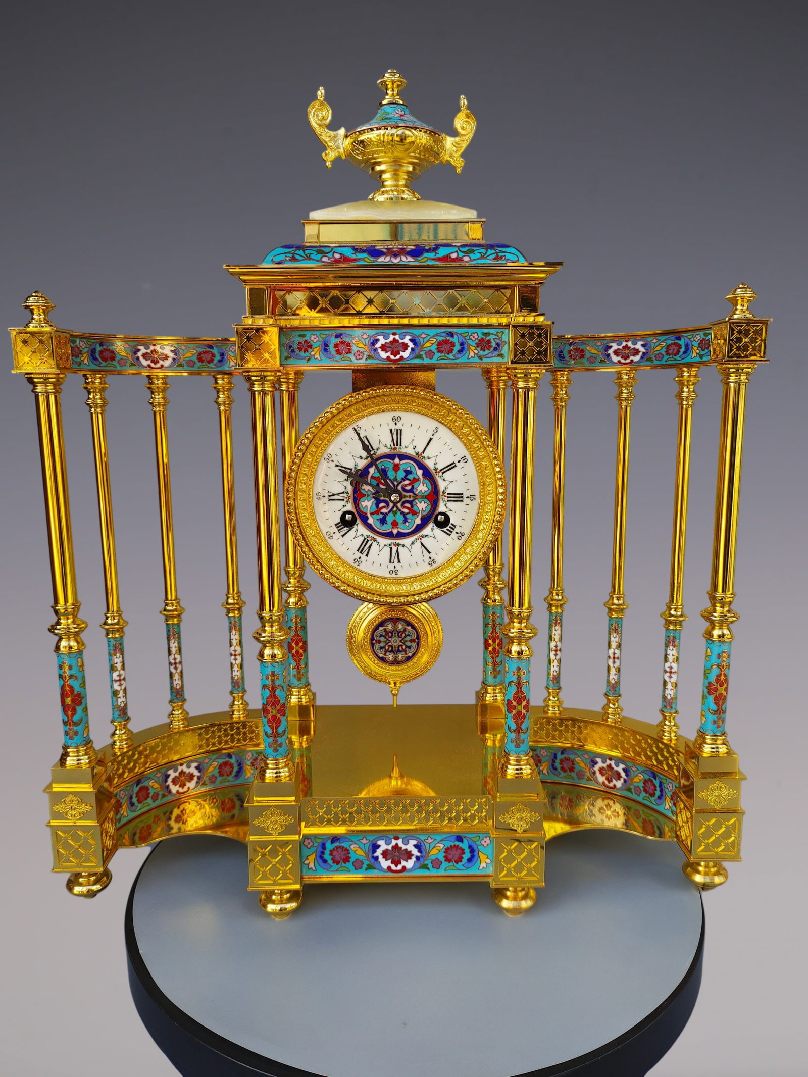 An Exquisite Gilt Bronze Lotus Pattern Clock: An Exquisite Gilt Bronze Lotus Pattern Clock Qing Dynasty, China Size:20.5inx7.5inx24.4in铜鎏金缠枝莲纹钟表 中国清代 Size: