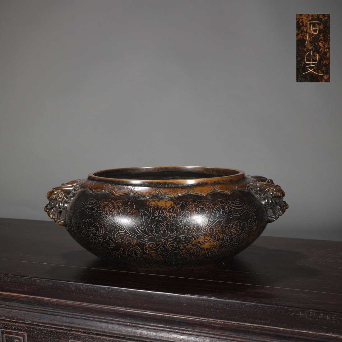 An Exquisite Bronze Lotus Pattern Censer: An Exquisite Bronze Lotus Pattern Censer Ming Dynasty, China Size:4.3inx10.2in Weight:5.1kg铜缠枝莲纹狮首耳钵式炉 中国