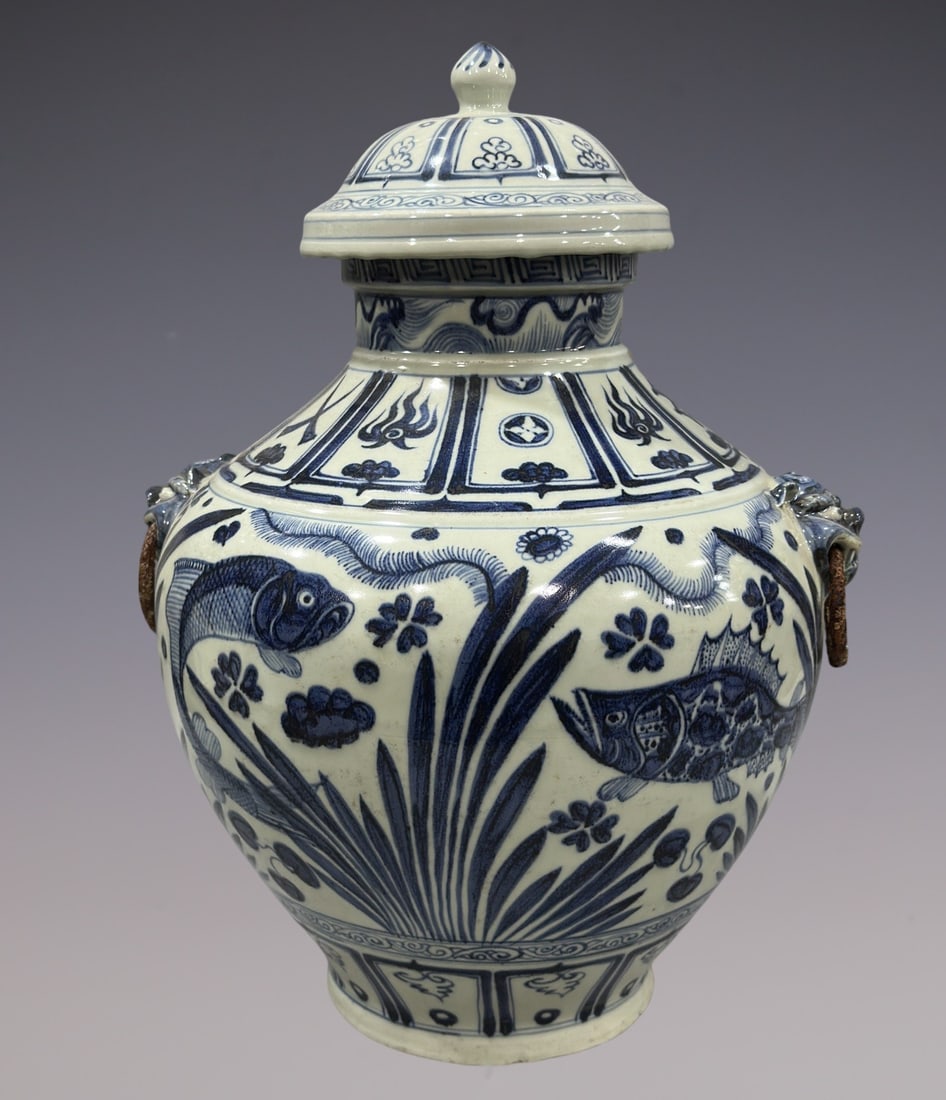 An Exquisite Blue and White Eight Treasures Pattern Fish and Lotus Pattern Double-Ears Jar: An Exquisite Blue and White Eight Treasures Pattern Fish and Lotus Pattern Double-Ears Jar Yuan Dynasty, China Size:18.1in青花八宝纹鱼澡罐 中Þ