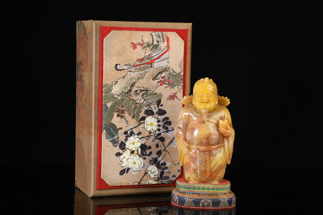 An Exquisite Shoushan Stone Figure Ornament: An Exquisite Shoushan Stone Figure Ornament Qing Dynasty, China Size:5.9inx3.1inx2in Weight:784g寿山石财主人物摆件 中国清代