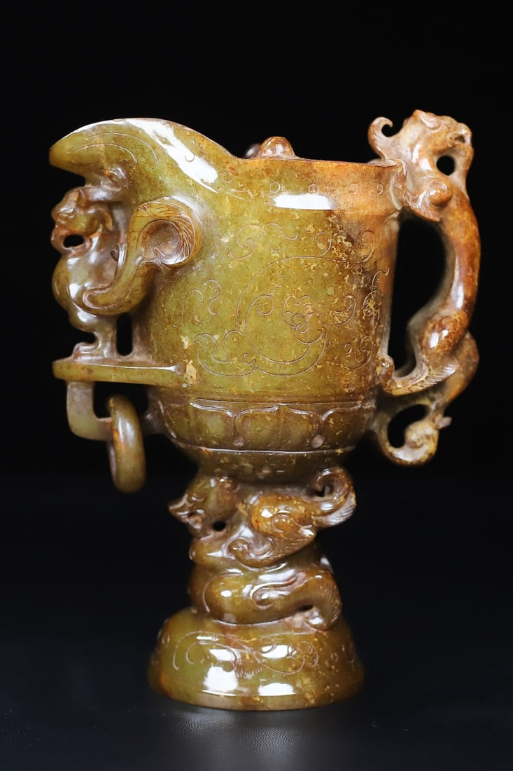 An Exquisite White Jade Dragon and Phoenix Pattern Cup: An Exquisite White Jade Dragon and Phoenix Pattern Cup Han Dynasty, China Size:5.6inx4.6inx2.8in Weight:611.5g白玉龙凤杯 中国汉代