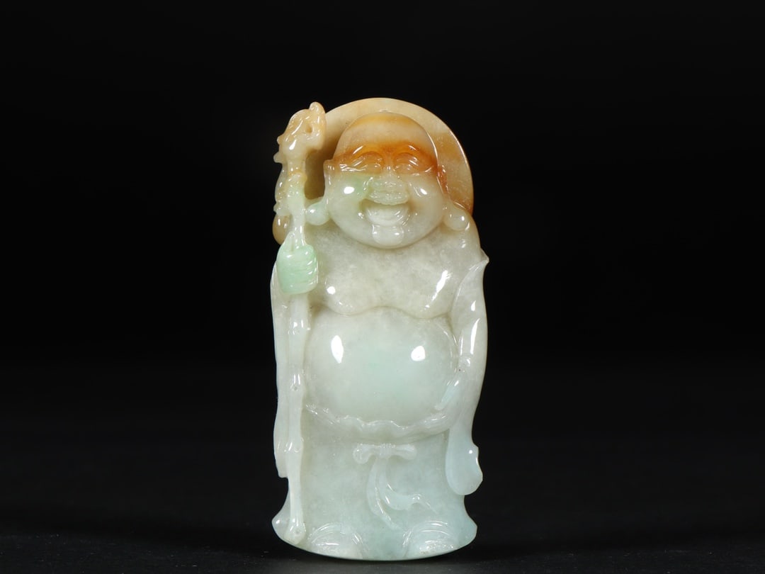 An Exquisite Jadeite Statue of Maitreya Buddha Ornament: An Exquisite Jadeite Statue of Maitreya Buddha Ornament Qing Dynasty, China Size:1.2inx0.5inx2.5in Weight:44g翡翠弥勒佛 中国清代
