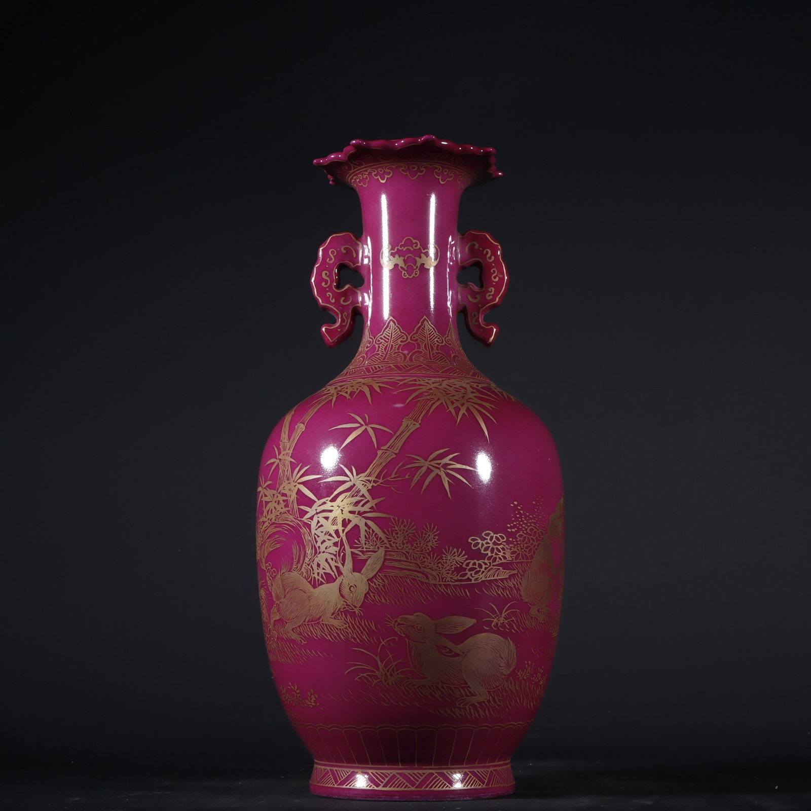 An Exquisite Ruby Red-Glazed Painted Gold Rabbit Pattern Flower Pattern Double-Ears Vase: An Exquisite Ruby Red-Glazed Painted Gold Rabbit Pattern Flower Pattern Double-Ears Vase Qing Dynasty, China Qianlong Six-character Mark Size:10.2inx5.1in胭脂红描金ࡡ