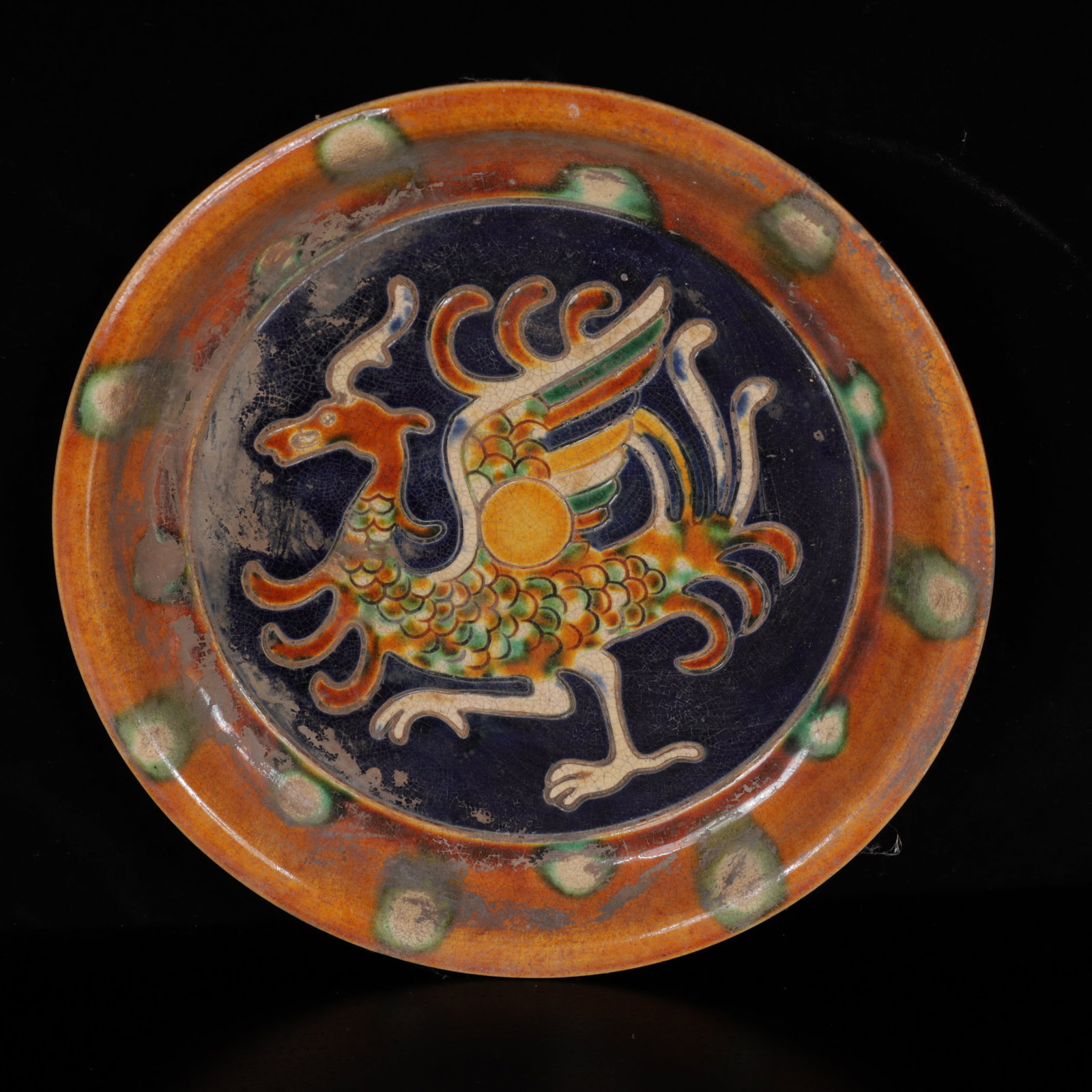 An Exquisite Tang Tri-Color Glazed Pottery Auspicious Beast Plate: An Exquisite Tang Tri-Color Glazed Pottery Auspicious Beast Plate,Tang Dynasty,China,Size:8.7inx8.7inx1.2in,Weight:500g 唐三彩瑞兽盘,中国唐代