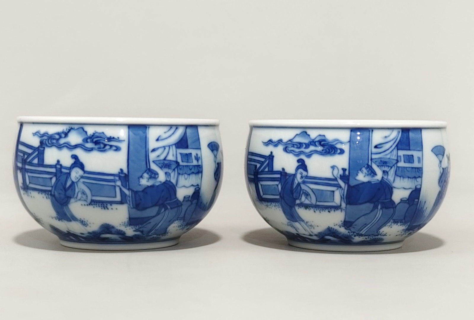 A Pair of Exquisite Blue and White Figure Cups: A Pair of Exquisite Blue and White Figure Cups,Qing Dynasty,China,Kangxi Six-character Mark,Size:2.1inx3.3in