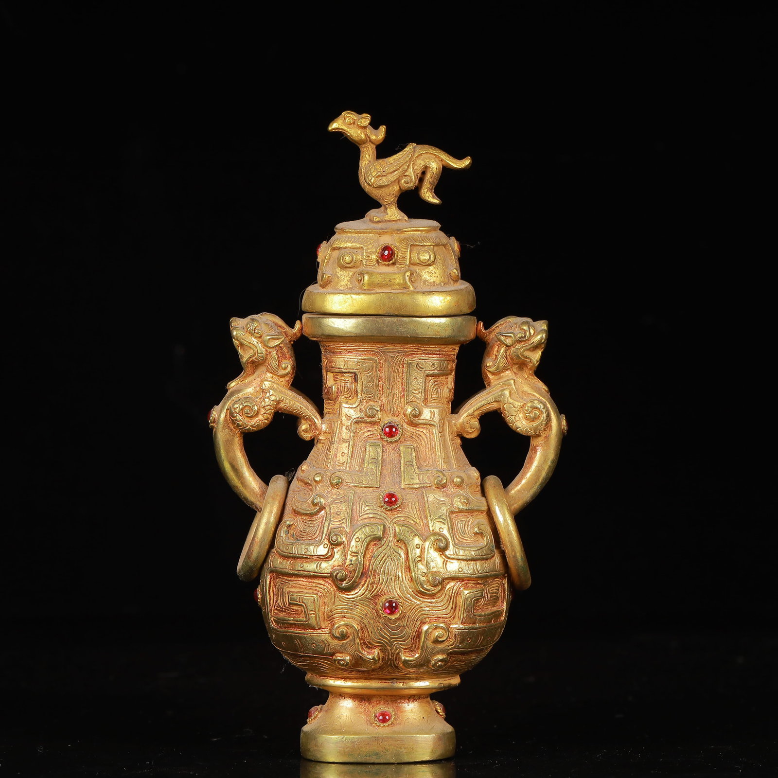 An Exquisite Gilt Bronze Phoenix Pattern Beast-Ears Tripod Vase,Inlaid Gems: An Exquisite Gilt Bronze Phoenix Pattern Beast-Ears Tripod Vase,Inlaid Gems,Qing Dynasty,China,Size:3.9inx2inx6.7in,Weight:893g 铜鎏金凤纹兽耳三足