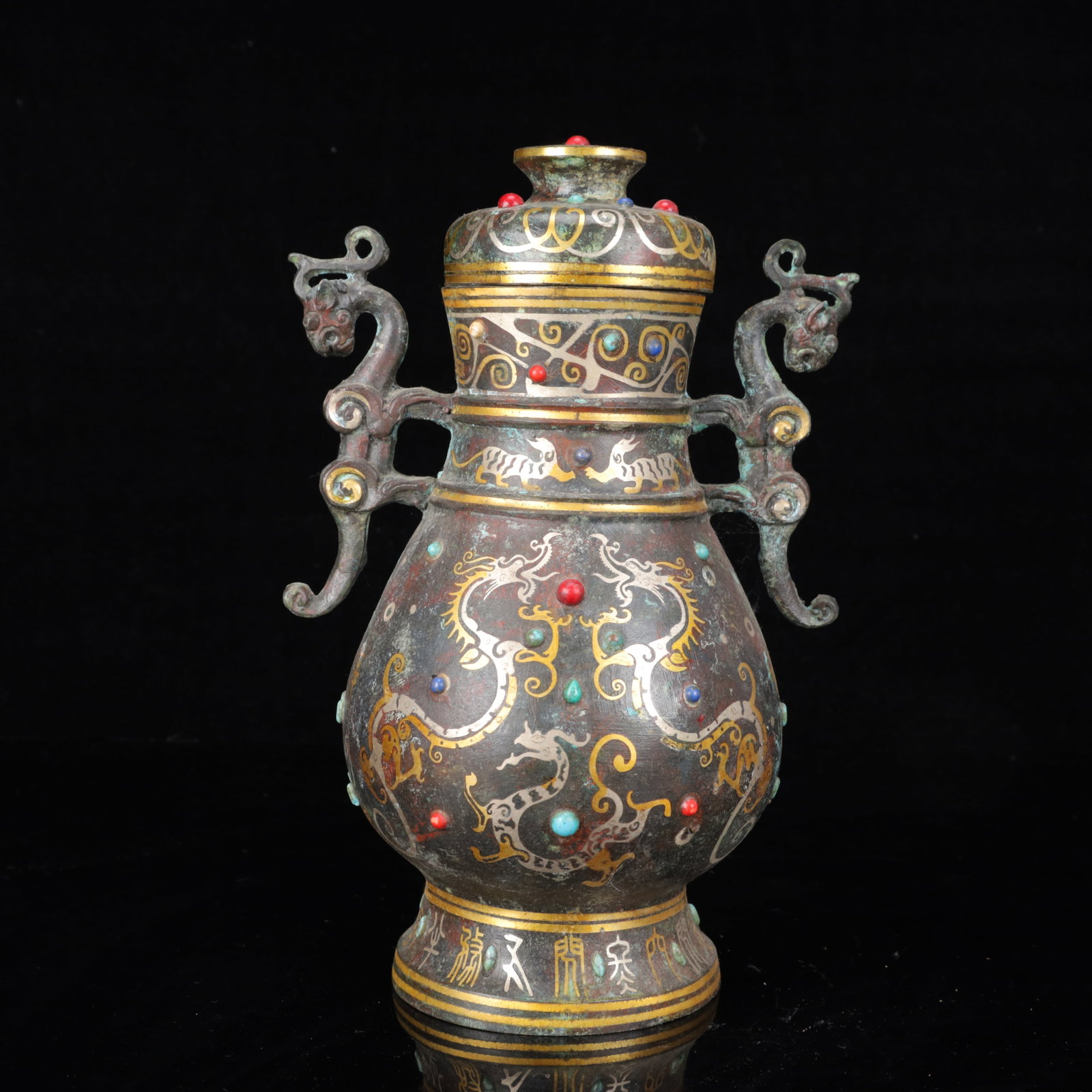 An Archaic Bronze Inlaid Gold and Silver Dragon Pattern Double-Ears Vase,Inlaid Gems: An Archaic Bronze Inlaid Gold and Silver Dragon Pattern Double-Ears Vase,Inlaid Gems,The Warring States period in China,Size:7.5inx5.9inx10.6in,Weight:2450g 铜错金银龙