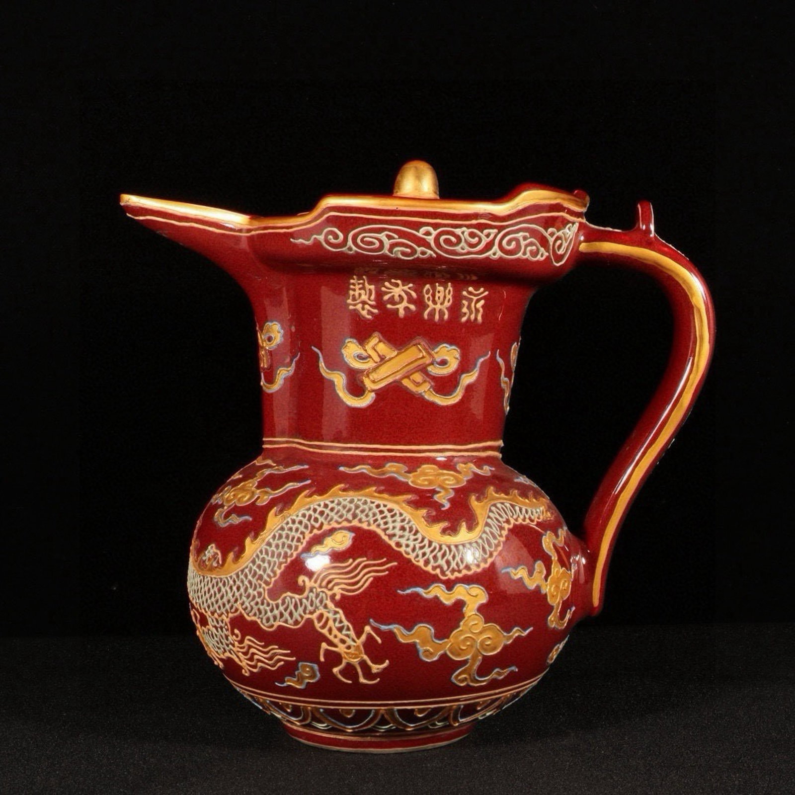 An Exquisite Red Glazed Painted Gold Auspicious Cloud and Dragon Pattern Pot: An Exquisite Red Glazed Painted Gold Auspicious Cloud and Dragon Pattern Pot,Ming Dynasty,China,Yongle Four-character Mark,Size:7.7inx8.5in 红釉描金祥云龙 
