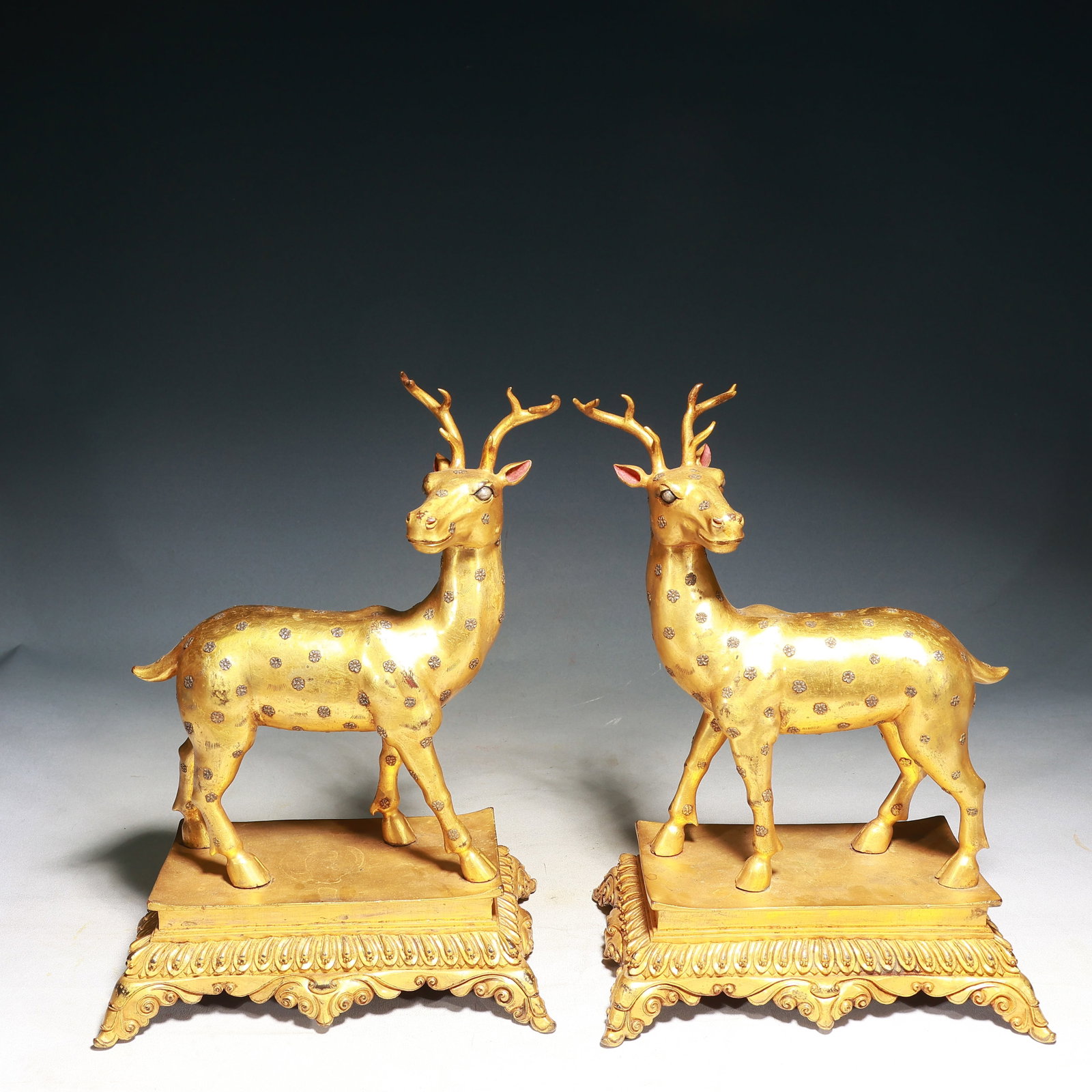 A Pair of Rare Gilt Bronze Statue of Sakyamuni: A Pair of Rare Gilt Bronze Statue of Sakyamuni,Qing Dynasty, China,Size:10.6inx6.7inx15in,Weight:14300g 一对铜鎏金梅花鹿摆件,带底
