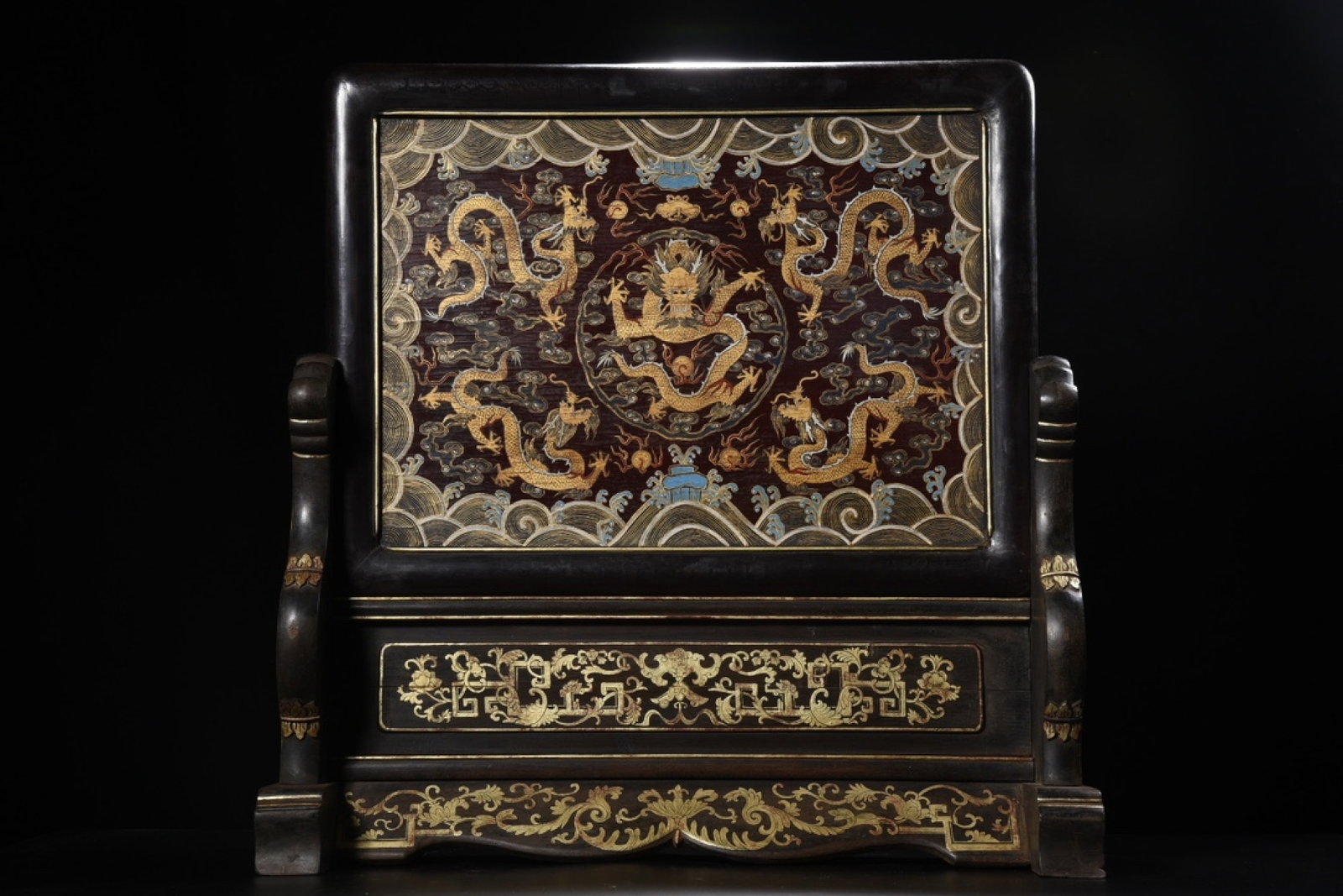 An Exquisite Carved Lacquer Painted Gold Auspicious Cloud and Dragon Pattern Table Screen: An Exquisite Carved Lacquer Painted Gold Auspicious Cloud and Dragon Pattern Table Screen,Qing Dynasty,China,Size:23.6inx22.8inx7.9in,Weight:5045g 漆器描金祥云Ƙ