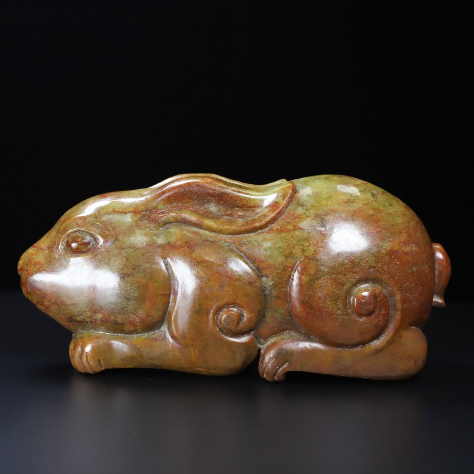 An Exquisite Archaic Jade Rabbit Ornament: An Exquisite Archaic Jade Rabbit Ornament,Ancient Time,China,Size:12.6inx5.9inx4.7in,Weight:8800g 高古玉兔子摆件,中国远古时ć
