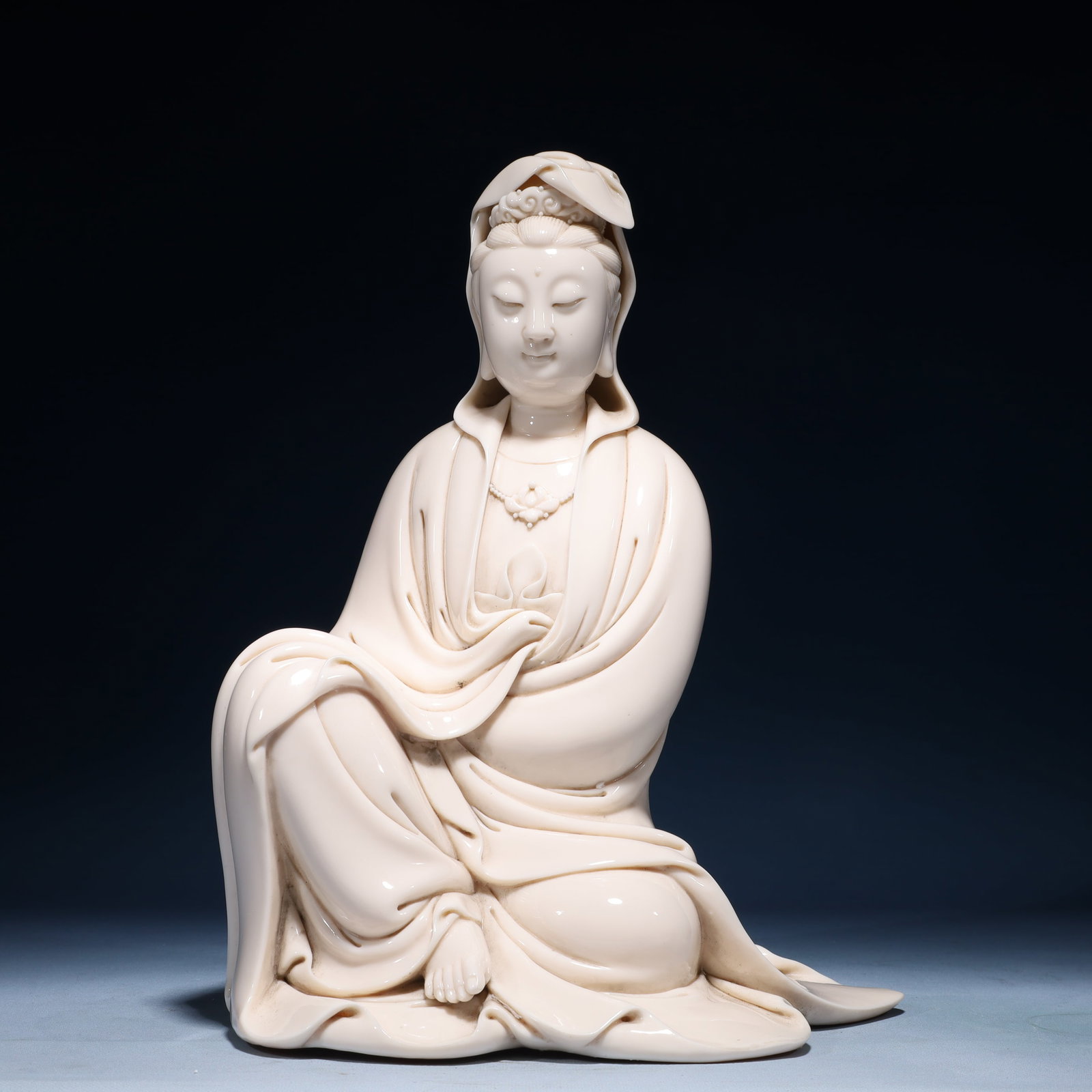 A Solemn Blance-De-Chine Statue of Avalokitesvara: A Solemn Blance-De-Chine Statue of Avalokitesvara Blance-De-Chine Statue of Avalokitesvara,Ming Dynasty,China,He Chaozong Mark,Size:9.4inx7.1inx13.8in,Weight:4050g 德化瓷观&