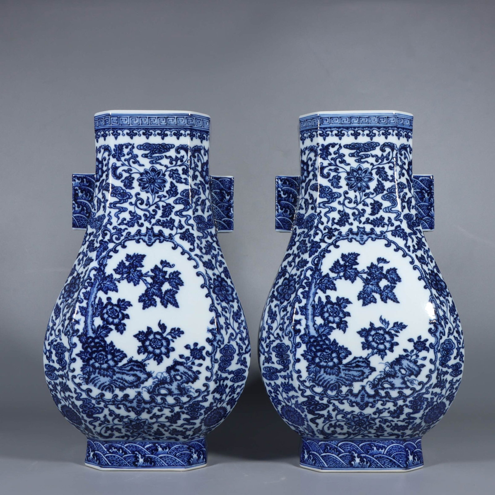A Pair of Rare Blue and White Lotus Pattern Double-Ears Vases: A Pair of Rare Blue and White Lotus Pattern Double-Ears Vases,Qing Dynasty,China,Yongzheng Six-character Mark,Size:15.2inx8.7in 一对青花缠枝莲纹双