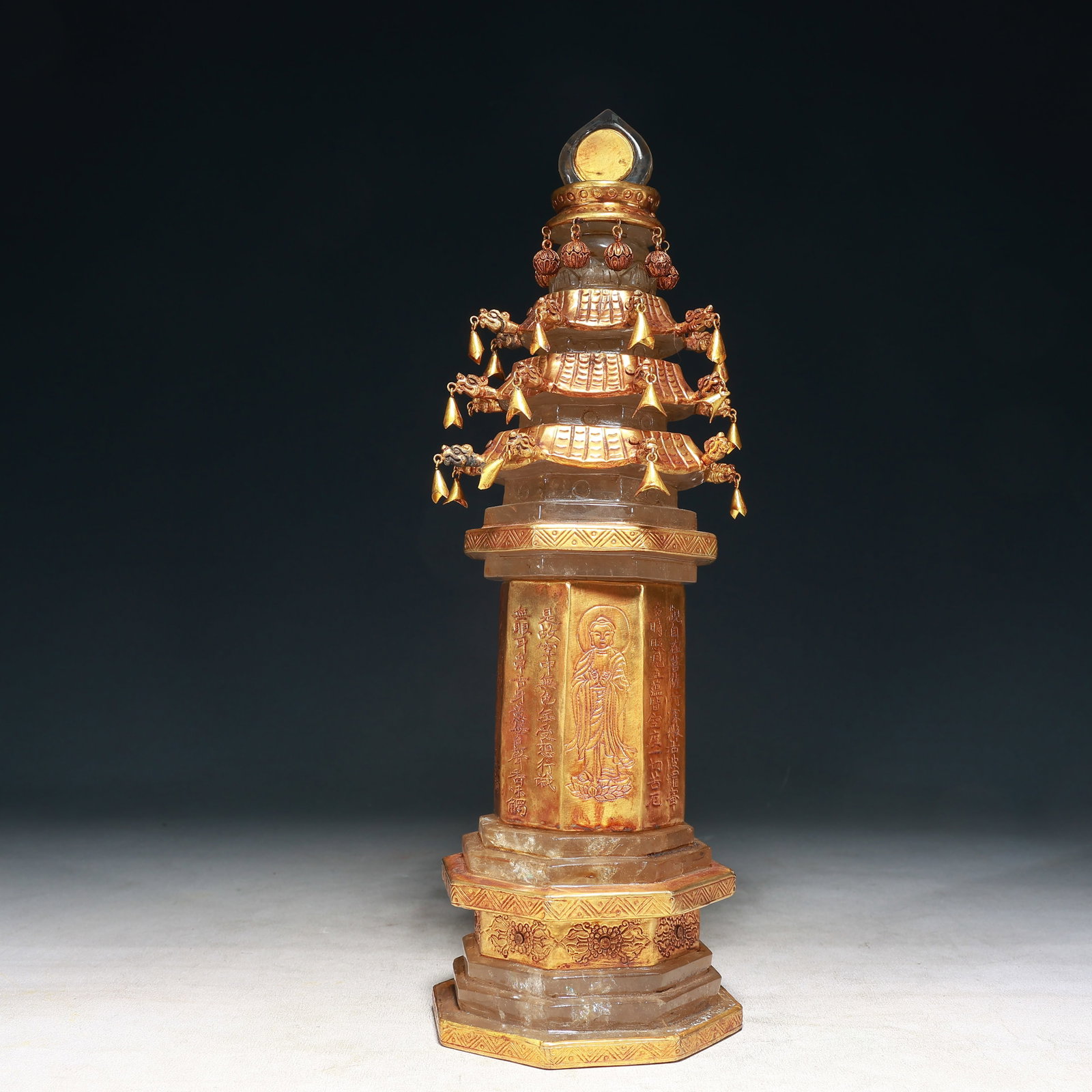A Rare Crystal Cover with Gold Buddha Statue Pattern Pagoda,With Scriptures: A Rare Crystal Cover with Gold Buddha Statue Pattern Pagoda,With Scriptures,Tang Dynasty, China,Zhenguan Four-character Mark,Size:4.7inx14.6in,Weight:3450g 水晶包金佛