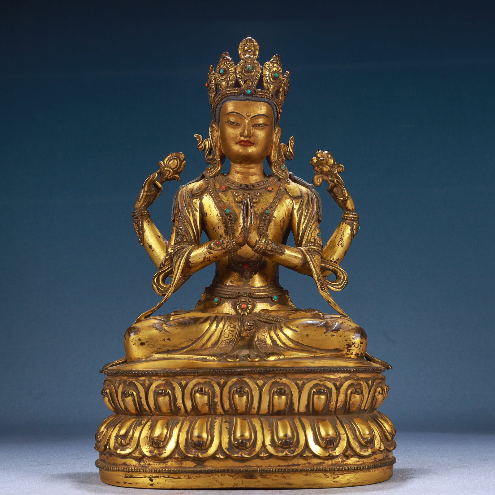 A Solemn Gilt Bronze Four-arms Statue of Avalokitesvara,Inlaid Gems and Turquoise: A Solemn Gilt Bronze Four-arms Statue of Avalokitesvara,Inlaid Gems and Turquoise,Qing Dynasty, China,Size:8.7inx6.7inx15.4in,Weight:7450g