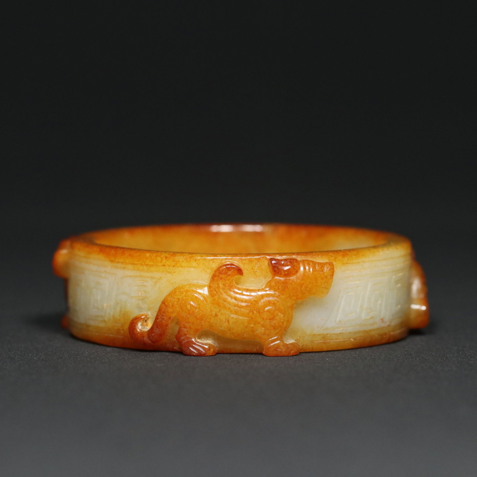 An Exquisite White Jade Animal Pattern Bracelet: An Exquisite White Jade Animal Pattern Bracelet,Western Zhou Dynasty,China,Size:2.9inx0.8inx2.3in,Weight:74.8g