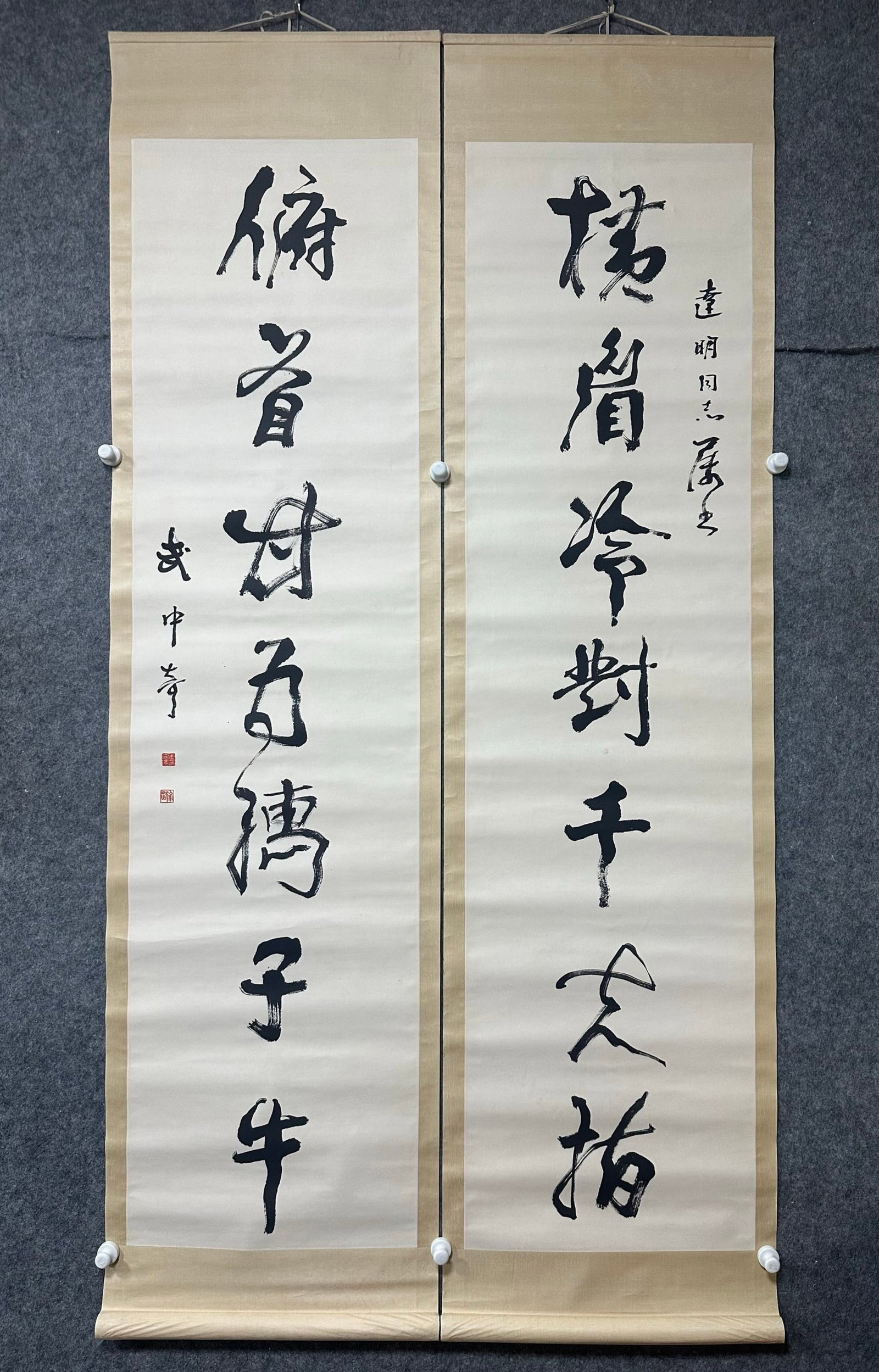 A Chinese Vertical Scroll Ink Calligraphy Couplet on Paper: A Chinese Vertical Scroll Ink Calligraphy Couplet on Paper,Wu Zhongqi,Size:18.1inx69.7in*2