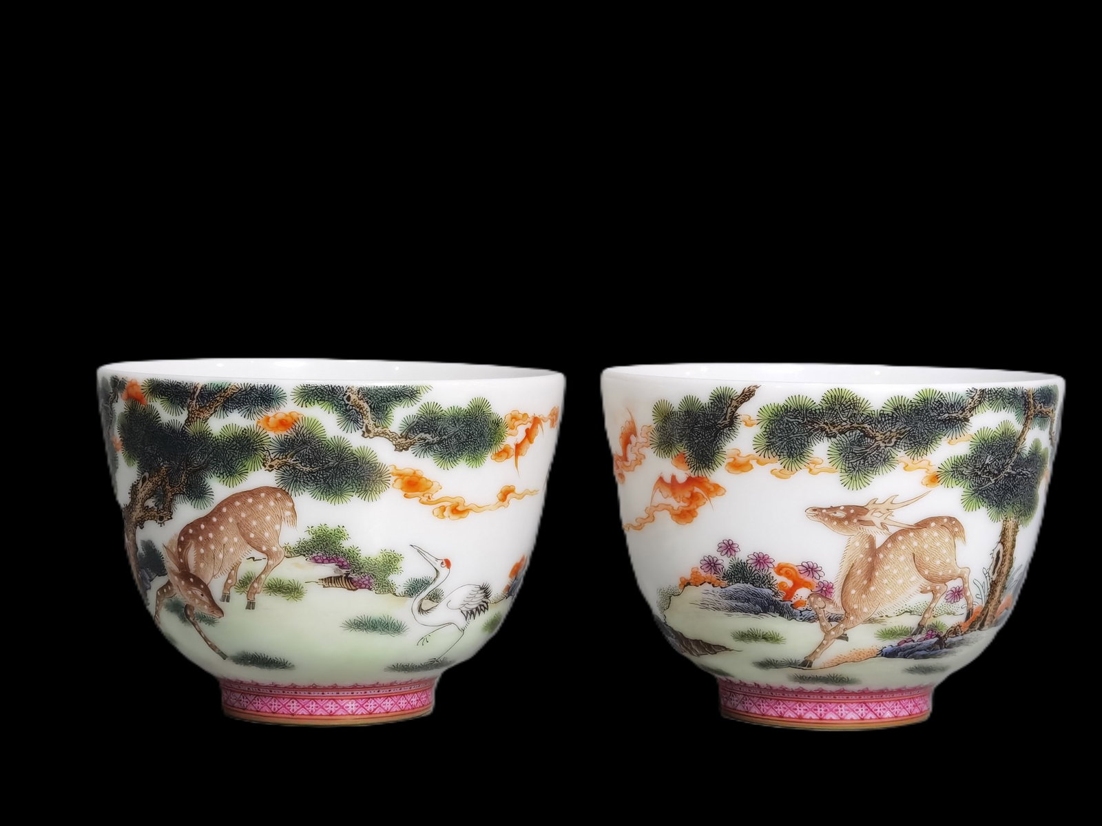 A Pair of Exquisite Enamel Pine and Deer Pattern Cups,with poem: A Pair of Exquisite Enamel Pine and Deer Pattern Cups,with poem,Qing Dynasty,China,Qianlong Four-character Mark,Size:2.8inx2.1in 一对珐琅彩松鹿纹杯