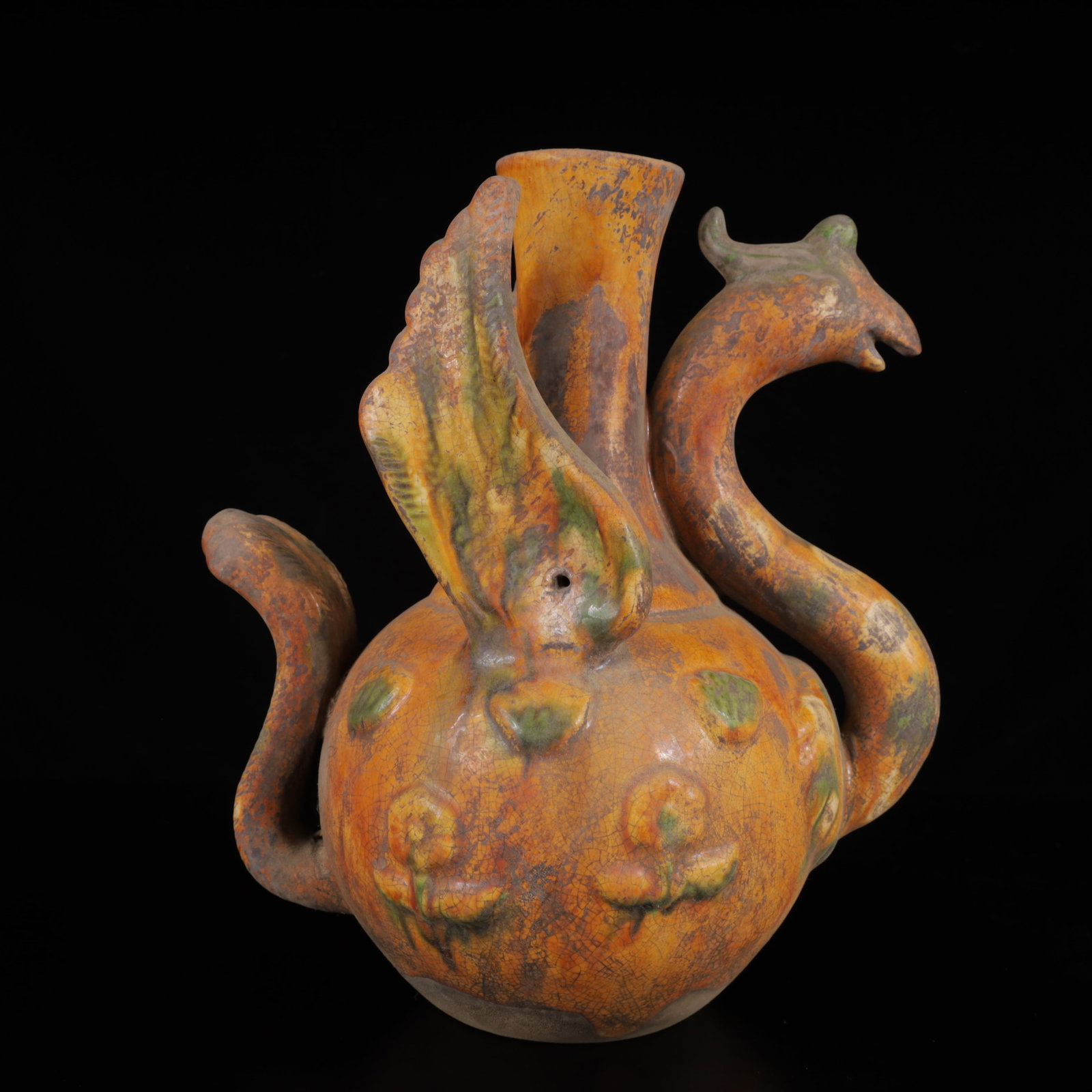 An Exquisite Tang Tri-Color Glazed Pottery Phoenix Pattern teapot: An Exquisite Tang Tri-Color Glazed Pottery Phoenix Pattern teapot,Tang Dynasty,China,Size:9.8inx8.3inx5.5in,Weight:1200g 唐三彩凤纹壶,中国唐ߣ