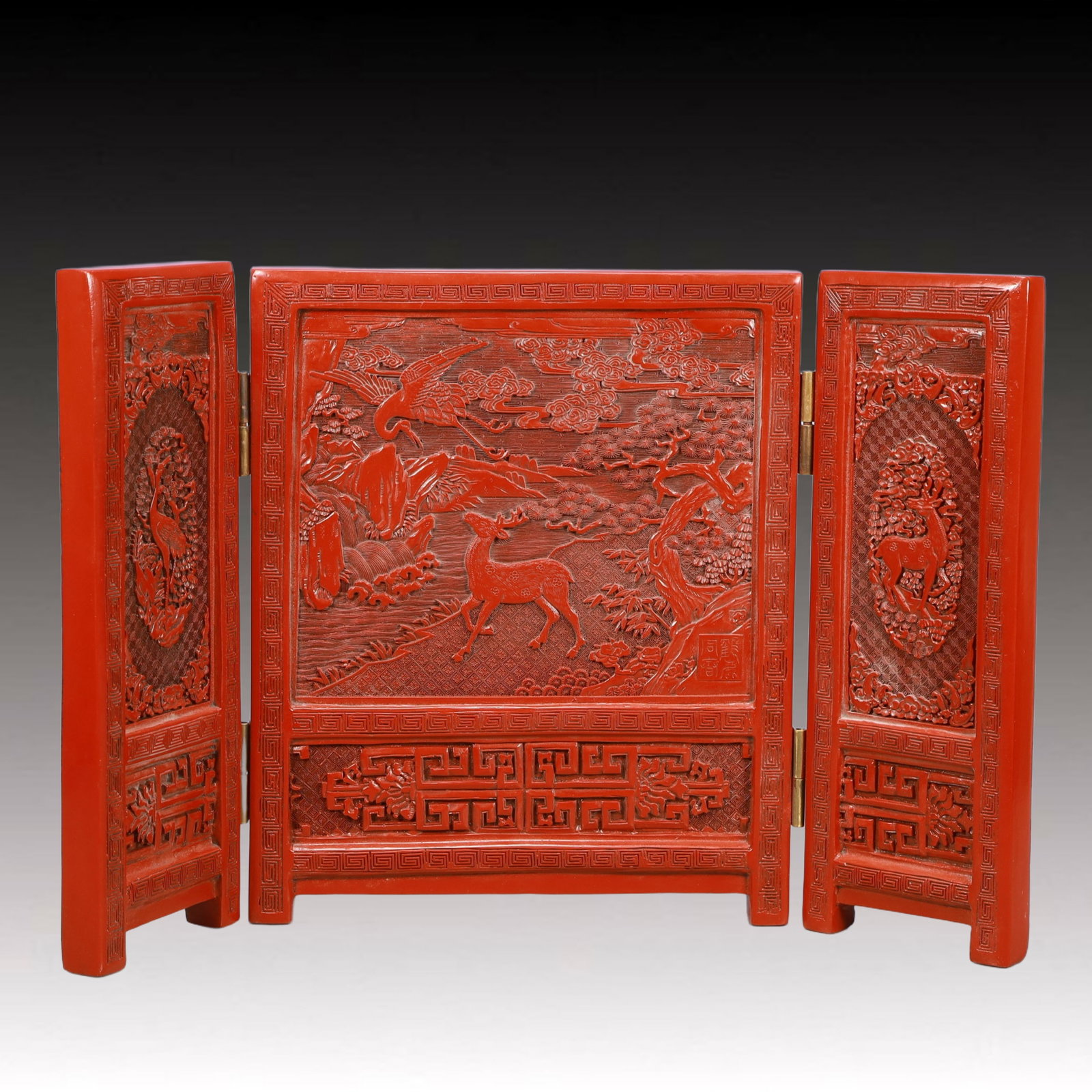 A Huge Carved Red Lacquer Deer and Crane Pattern Screen Ornament: A Huge Carved Red Lacquer Deer and Crane Pattern Screen Ornament,Qing Dynasty, China,Qianlong Six-character Mark,Size:20.5inx13inx1.2in,Weight:2800g 剔红漆器鹿鹤