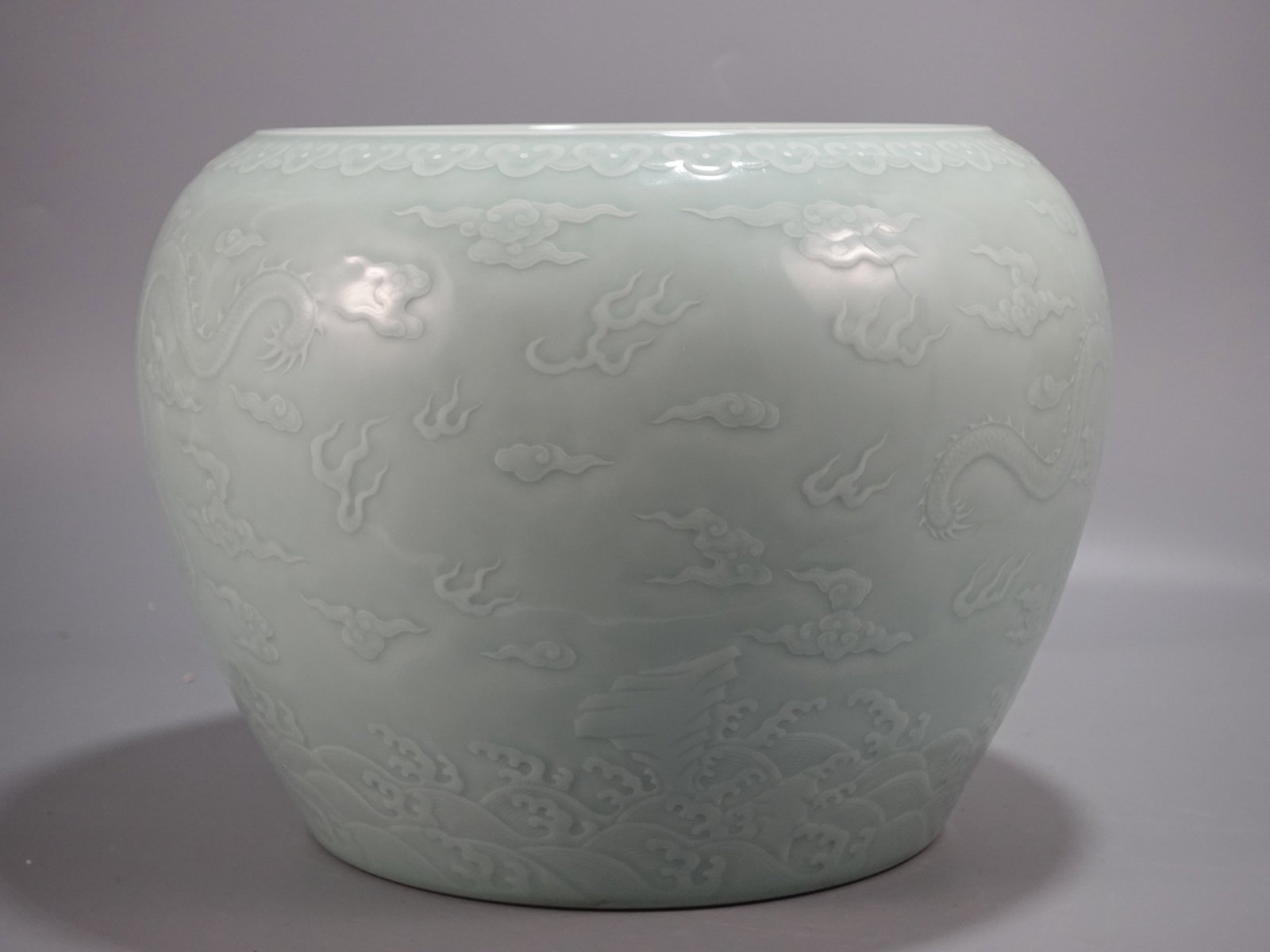 A Rare Celadon Glazed Auspicious Cloud and Dragon Pattern Vat - 4