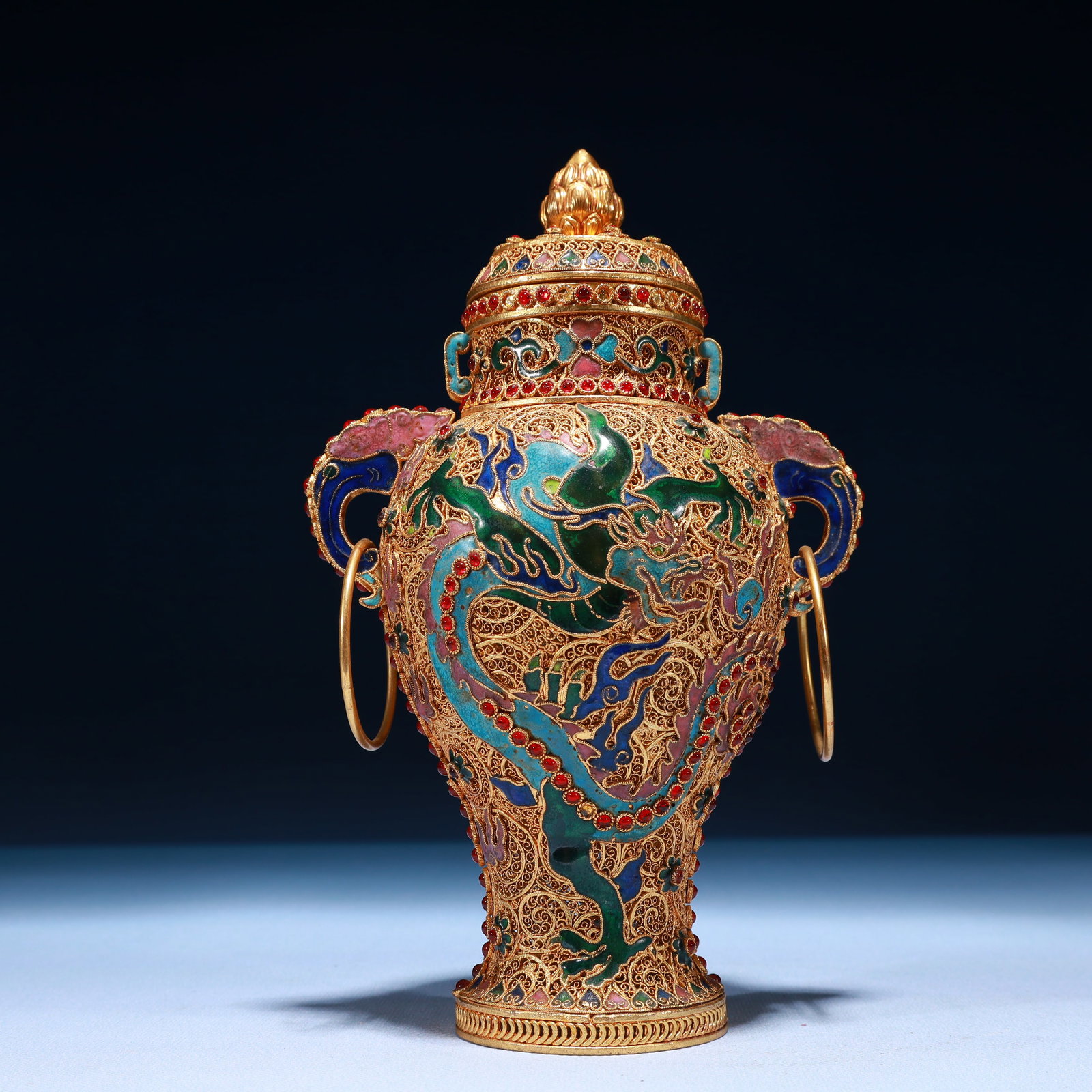 An Exquisite Filigree and Gilding Auspicious Cloud and Dragon Pattern Double-Ears Jar with: An Exquisite Filigree and Gilding Auspicious Cloud and Dragon Pattern Double-Ears Jar with Cover,Inlaid Gems,Qing Dynasty,China,Qianlong Four-character Mark,Size:5.5inx9.1in,Weight:550g 掐ߏ