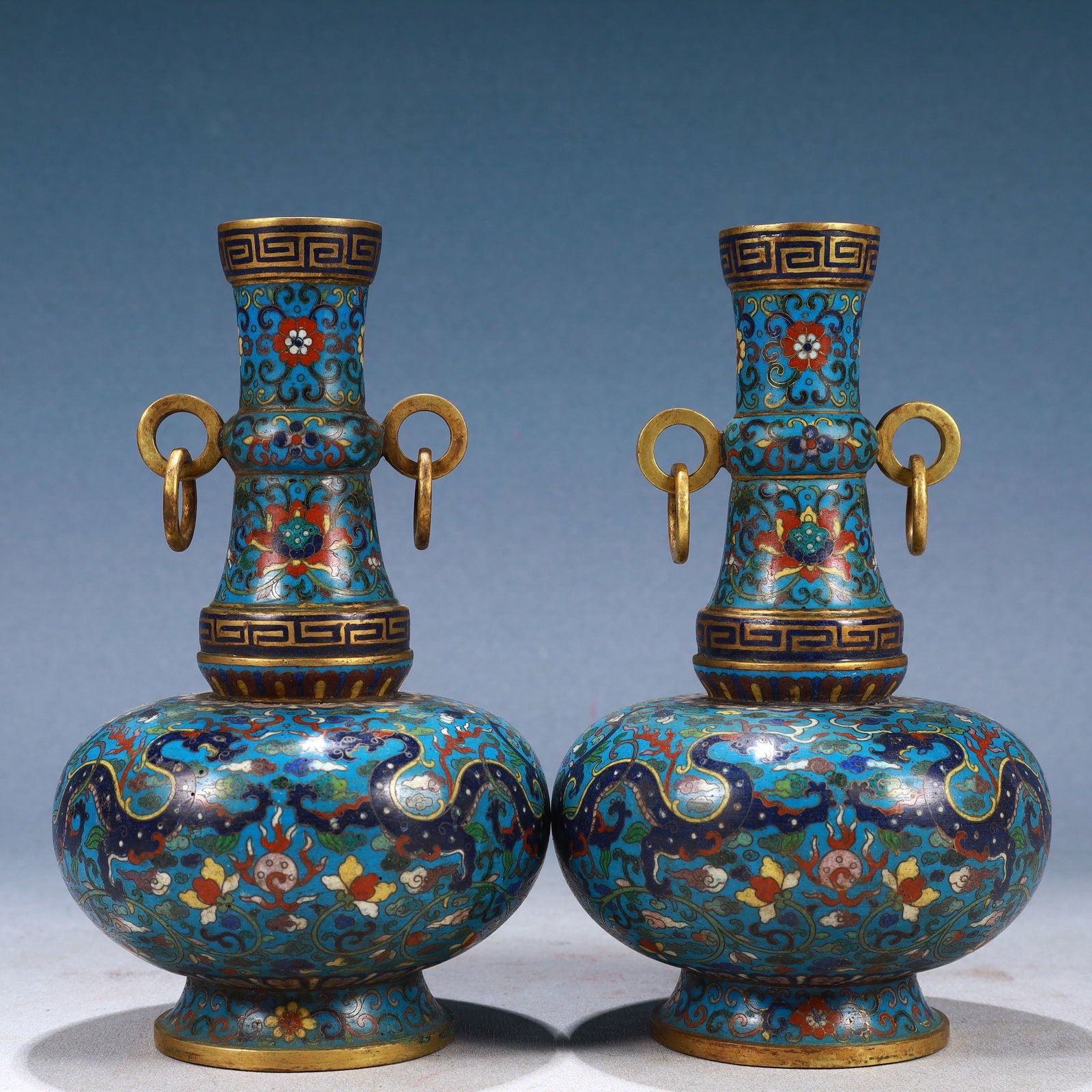 A Pair of Exquisite Cloisonne Auspicious Cloud and Dragon Pattern Double-Ears Vases: A Pair of Exquisite Cloisonne Auspicious Cloud and Dragon Pattern Double-Ears Vases,Qing Dynasty, China,Qianlong Four-character Mark,Size:4.7inx8.3in,Weight:2000g 一对景泰Ŕ