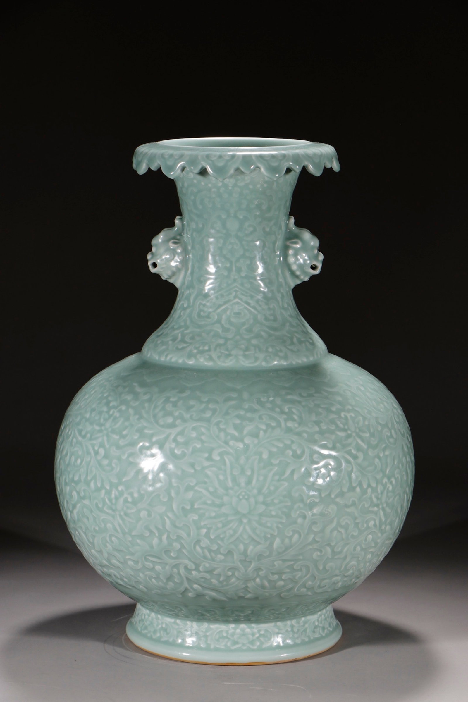 A Huge Celadon Glazed Lotus Pattern Beast-Ears Vase: A Huge Celadon Glazed Lotus Pattern Beast-Ears Vase,Qing Dynasty,China,Qianlong Six-character Mark,Size:19.5in 粉青釉缠枝莲纹兽耳瓶中&