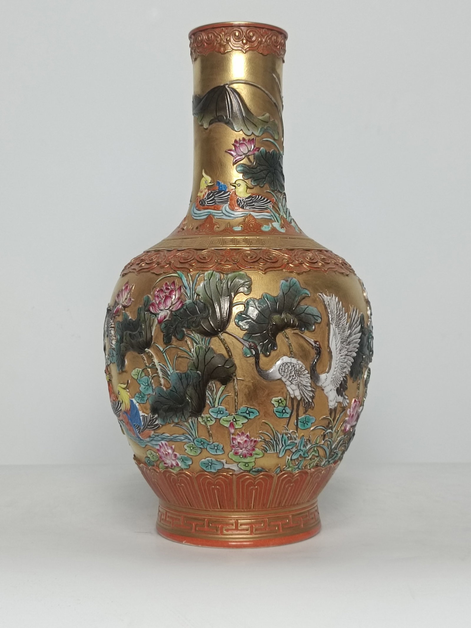 A Rare Famille-Rose Gold Ground Flower and Mandarin Duck Pattern Vase: A Rare Famille-Rose Gold Ground Flower and Mandarin Duck Pattern Vase,Qing Dynasty,China,Qianlong Six-character Mark,Size:14.2inx7.7in 粉彩金地花卉鸳鸯&