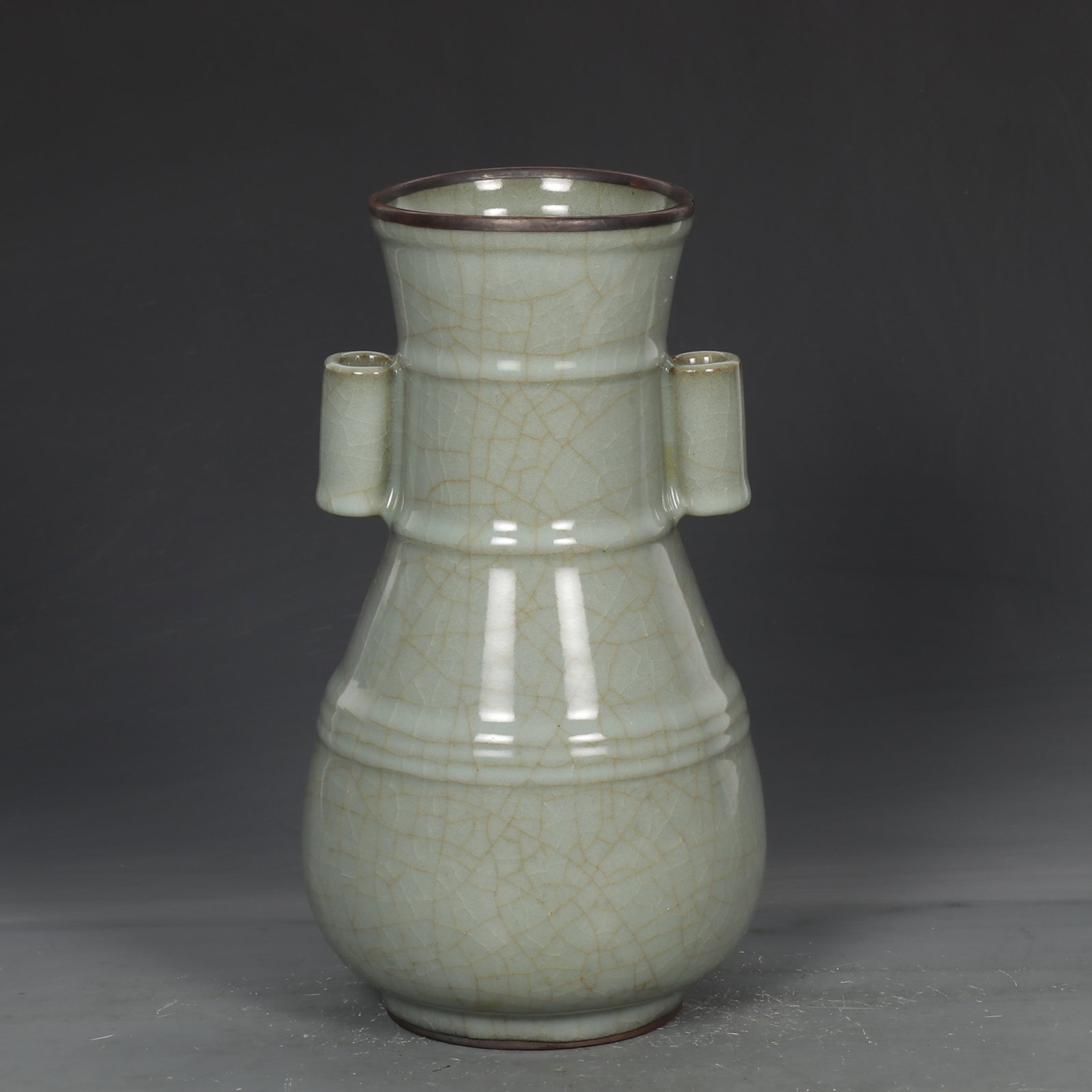 An Exquisite Guan yao Celadon Glazed Cover with Silver Double-Ears Vase,with an Imperial Poem by: An Exquisite Guan yao Celadon Glazed Cover with Silver Double-Ears Vase,with an Imperial Poem by Emperor Qianlong,Song Dynasty,China,Size:10.6inx5.9in 官窑青釉银口&