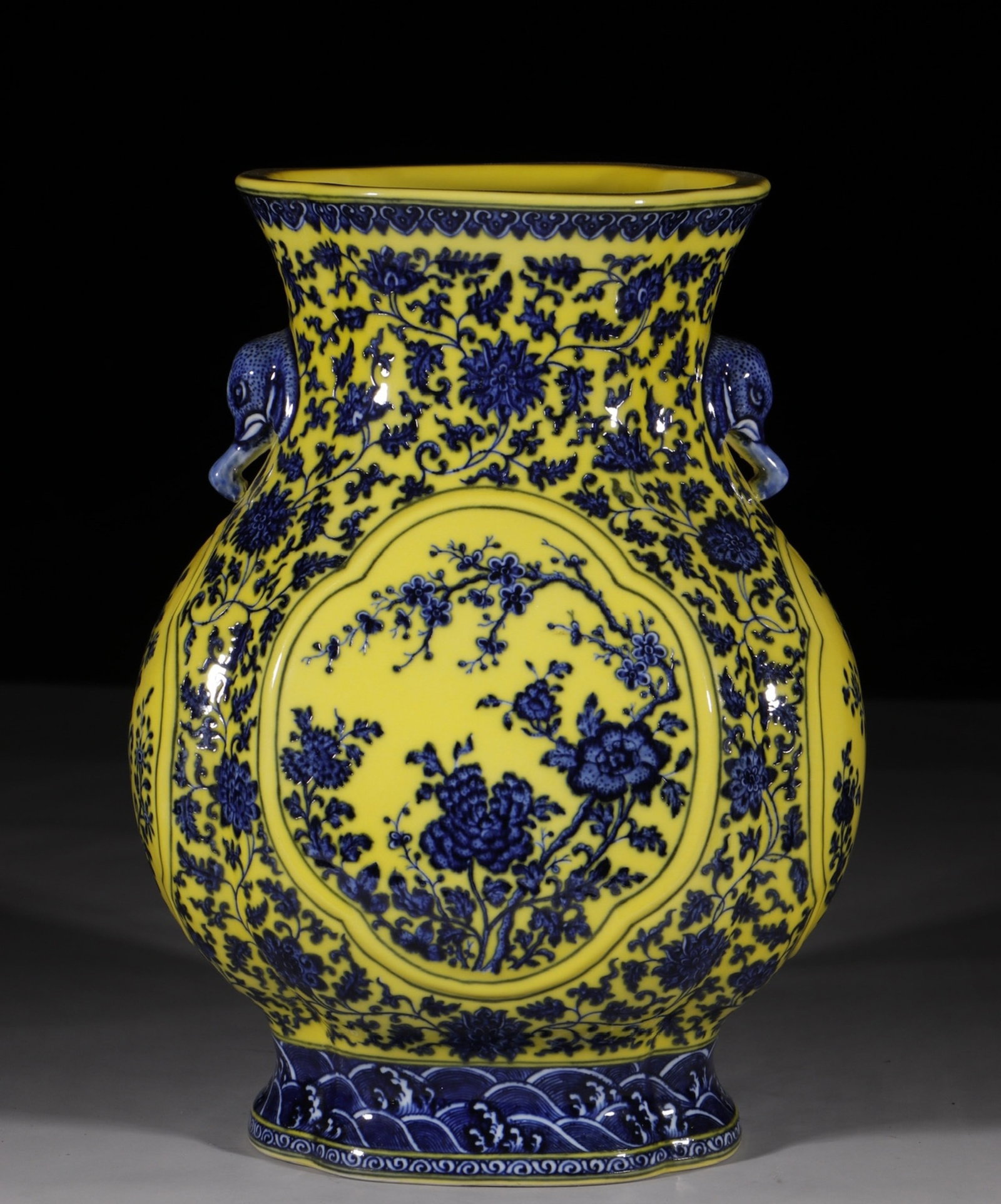 A Huge Yellow Ground Blue and White Lotus and Flower Pattern Elephant-Ears Vase: A Huge Yellow Ground Blue and White Lotus and Flower Pattern Elephant-Ears Vase,Qing Dynasty,China,Qianlong Six-character Mark,Size:16.5in