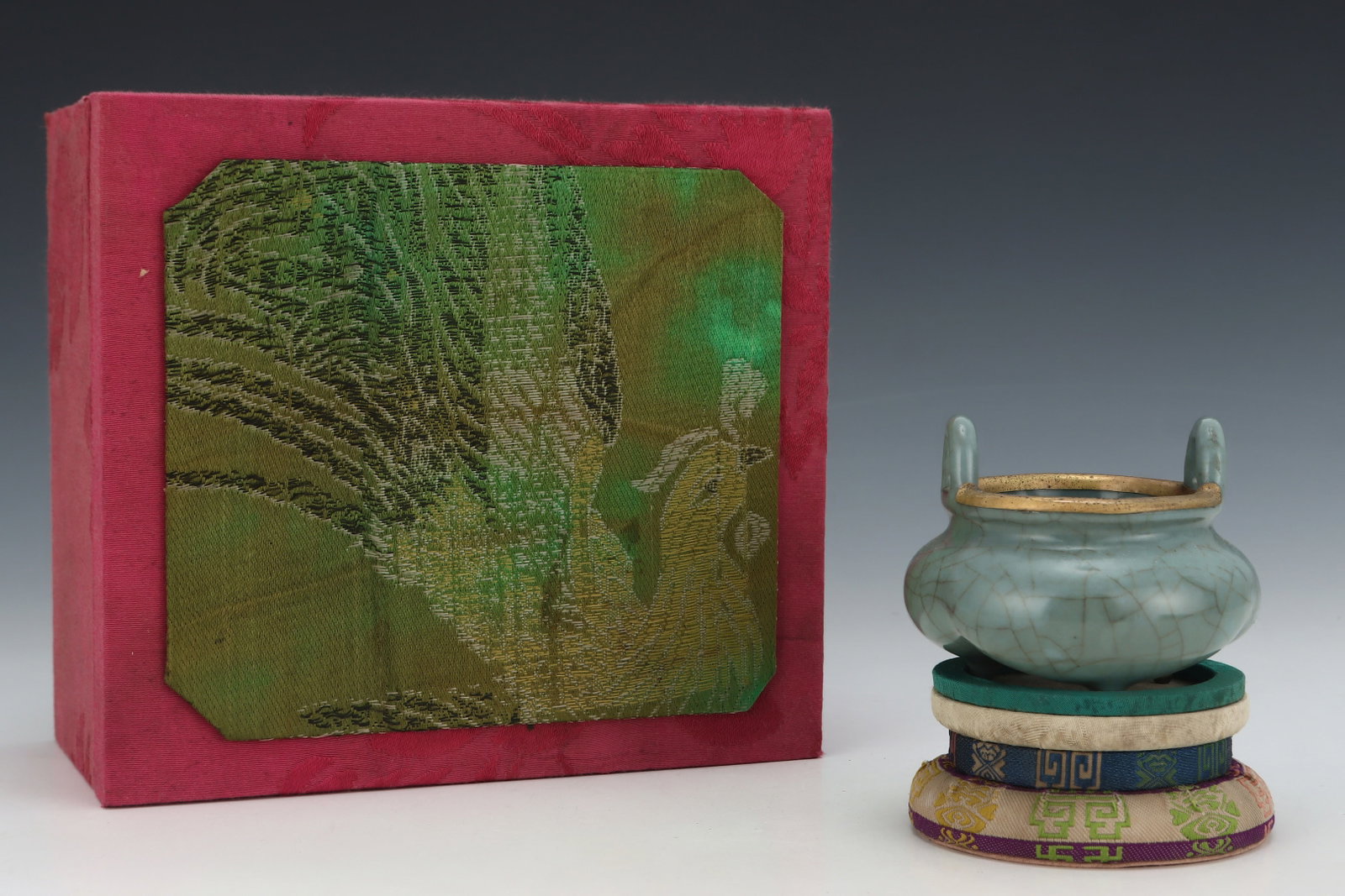 An Exquisite Guan yao Celadon Glazed Double-Ears and Tripod Censer: An Exquisite Guan yao Celadon Glazed Double-Ears and Tripod Censer,Song Dynasty,China,Size:3inx3.7in 官窑粉青釉双耳三足香炉,中&#