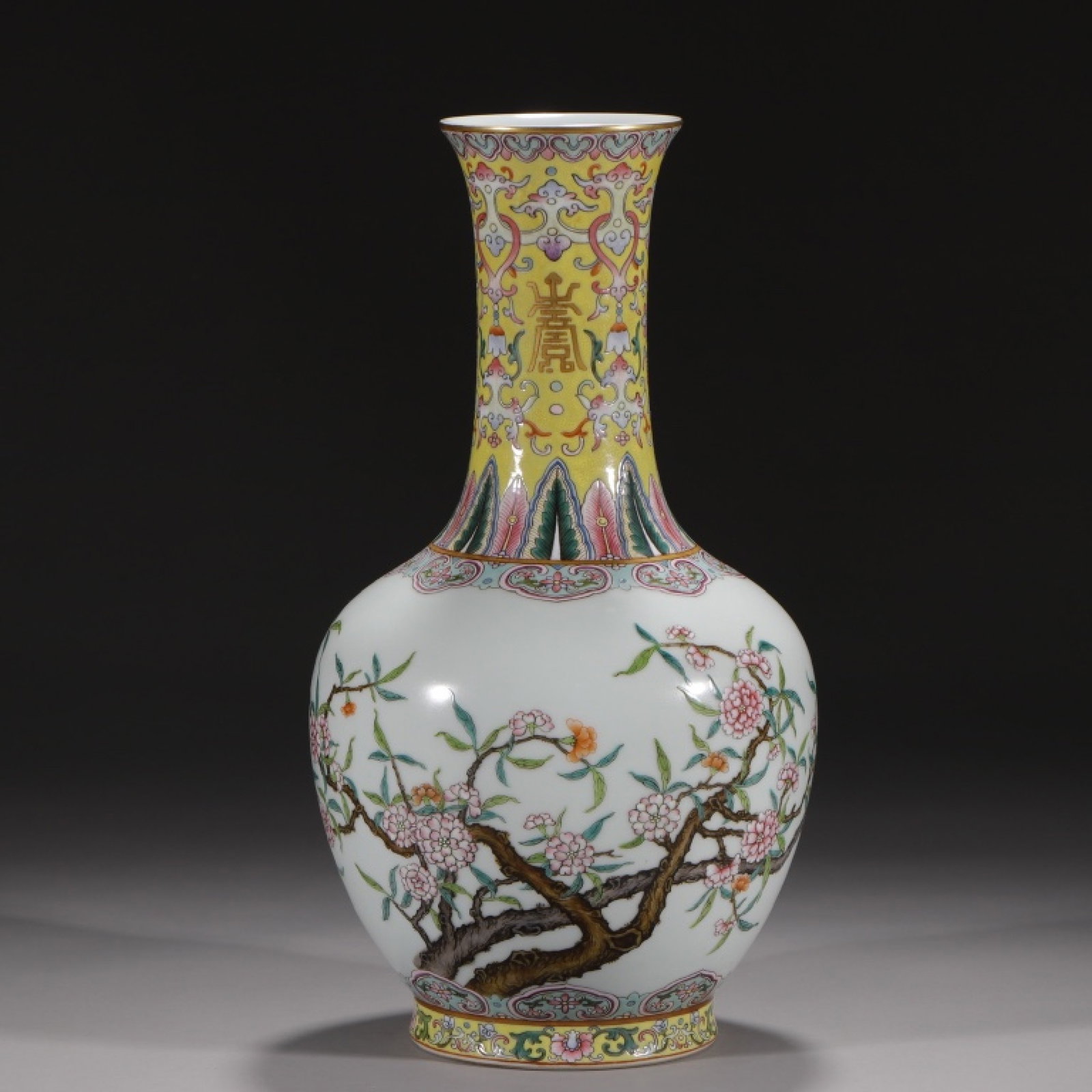 A Rare Famille-Rose Yellow Ground Flower Pattern Vase: A Rare Famille-Rose Yellow Ground Flower Pattern Vase,Qing Dynasty,China,Qianlong Six-character Mark,Size:12.8in