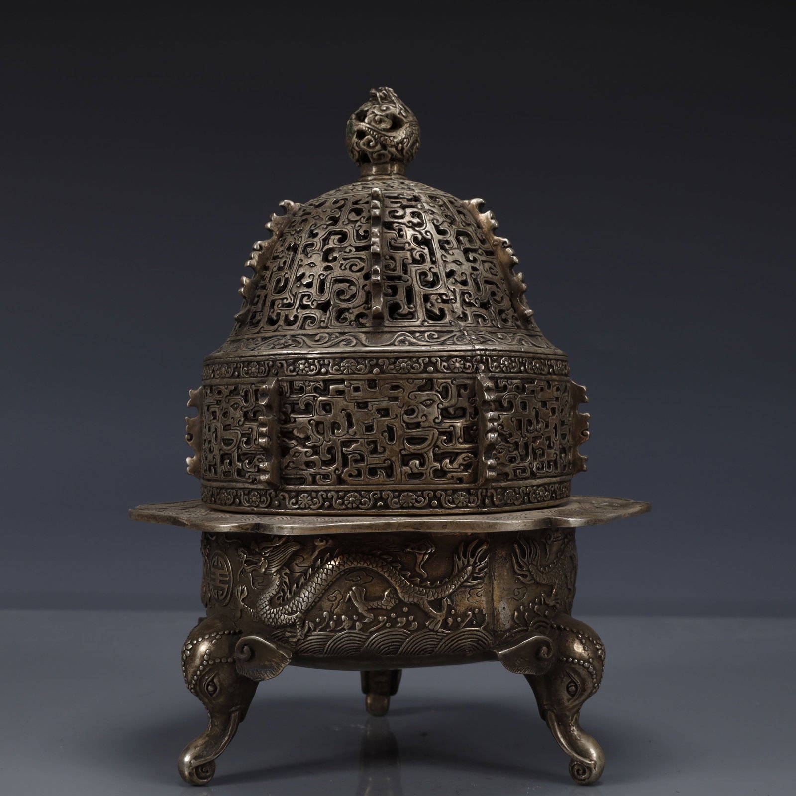 An Exquisite Silver-Plated Bronze Dragon Pattern Tripod Censer: An Exquisite Silver-Plated Bronze Dragon Pattern Tripod Censer,Qing Dynasty, China,Qianlong Four-character Mark,Size:6.9inx8.7in,Weight:1600 铜镀银龙纹三足