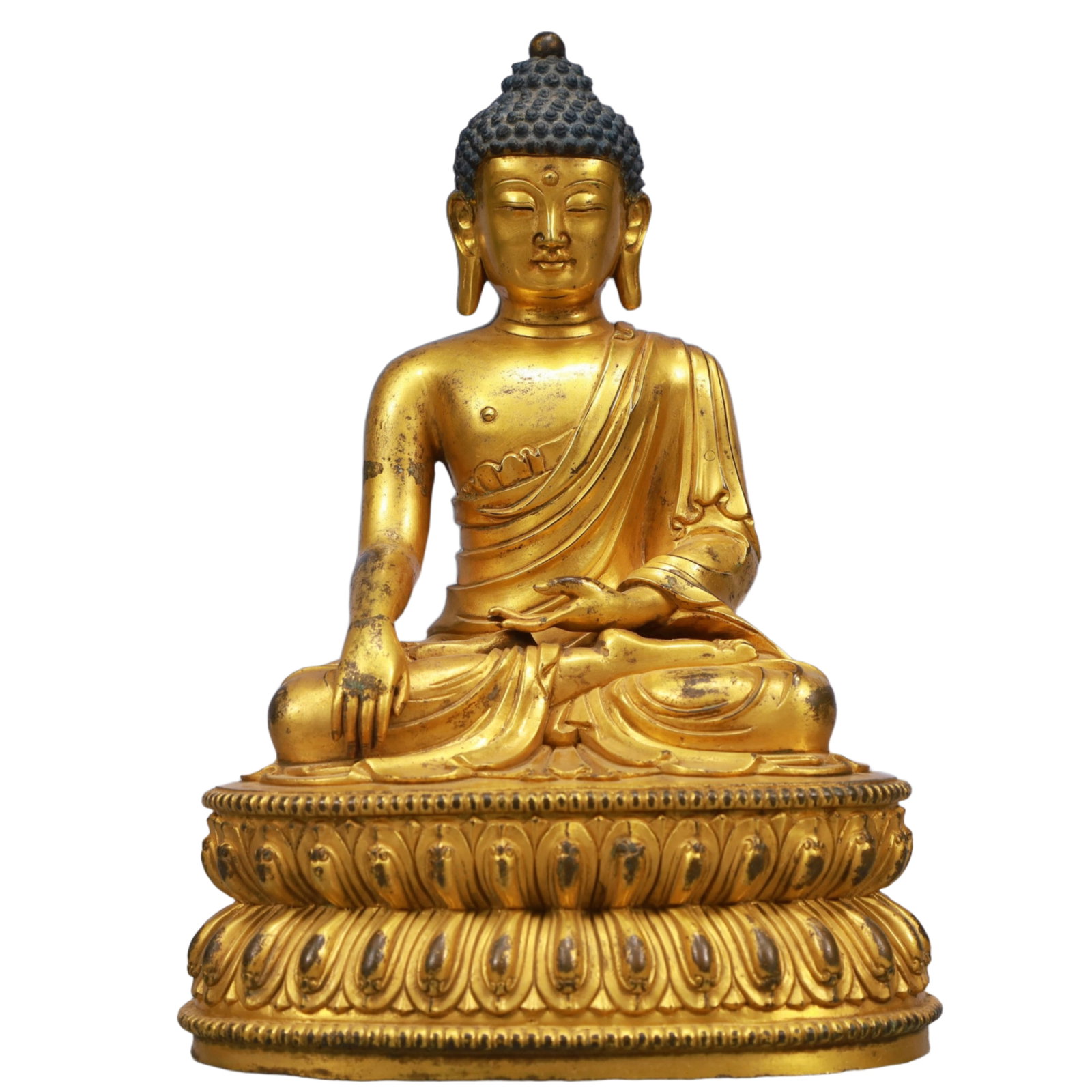 A Solemn Gilt Bronze Statue of Sakyamuni: A Solemn Gilt Bronze Statue of Sakyamuni,Qing Dynasty, China,Size:6.7inx4.9inx9.8in,Weight:3850g 铜鎏金如来像,中国清代