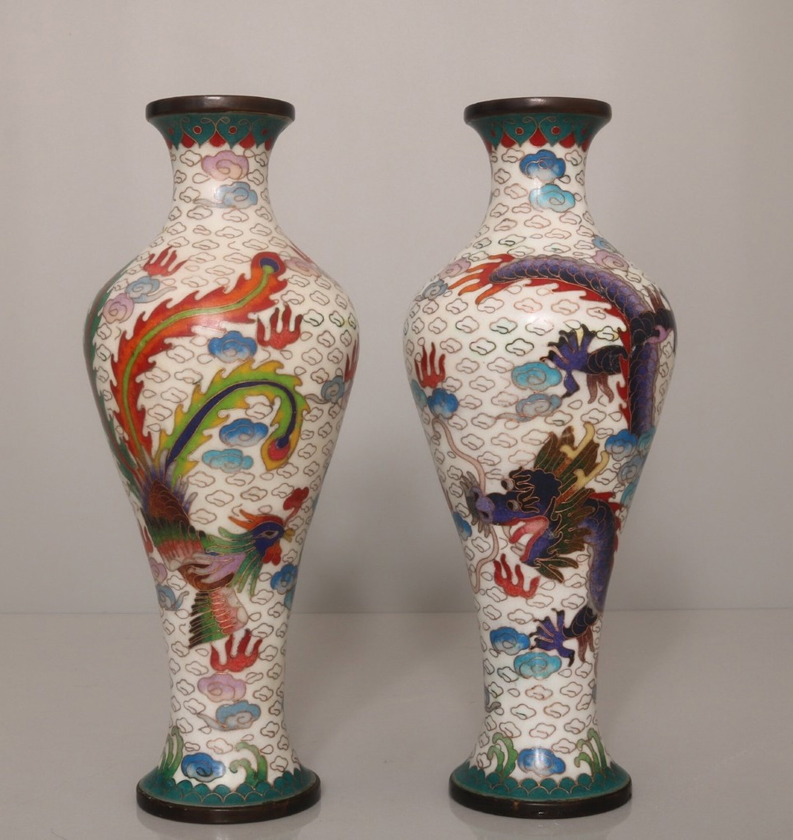 A Pair of Exquisite Cloisonne Dragon and Phoenix Pattern Vases: A Pair of Exquisite Cloisonne Dragon and Phoenix Pattern Vases,Qing Dynasty,China,Qianlong Four-Character Mark,Size:9.8inx3.9in*2,Weight:2540g