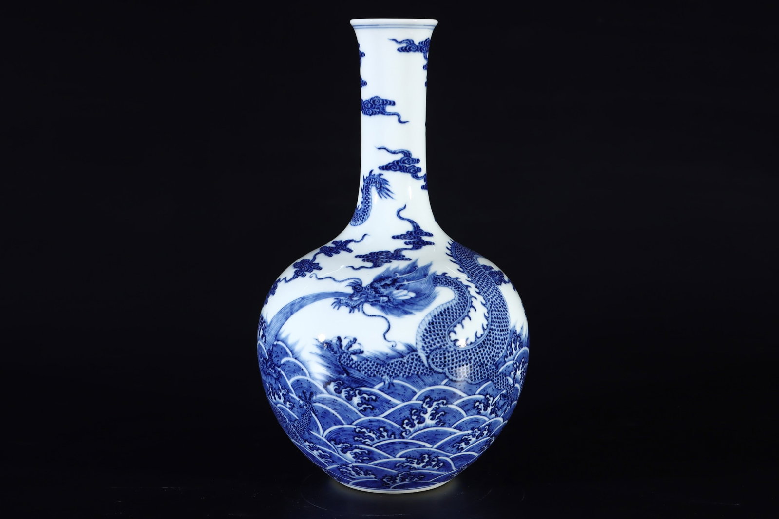 A Rare Blue and White Seawater and Dragon Pattern Vase: A Rare Blue and White Seawater and Dragon Pattern Vase,Qing Dynasty,China,Qianlong Six-character Mark,Size:14.2inx8.1in 青花海水龙纹瓶中国清