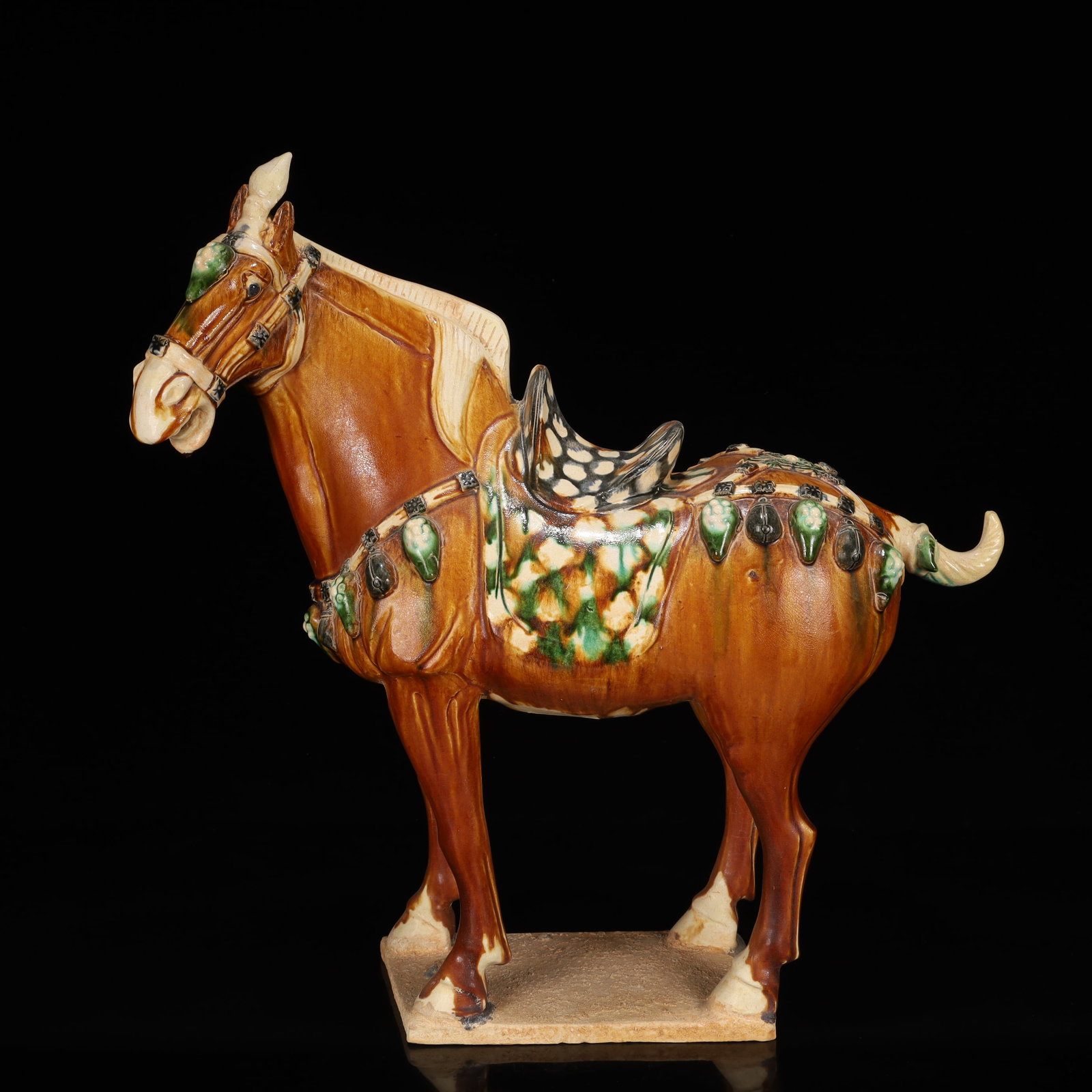 A Rare Tang Tri-Color Glazed Pottery Horse Ornament: A Rare Tang Tri-Color Glazed Pottery Horse Ornament,Tang Dynasty, China,Size:18.1inx6.7inx19.7in,Chinese Tang Tri-colored Pottery, or Tang Sancai, flourished during the Tang Dynasty (618–907 AD)