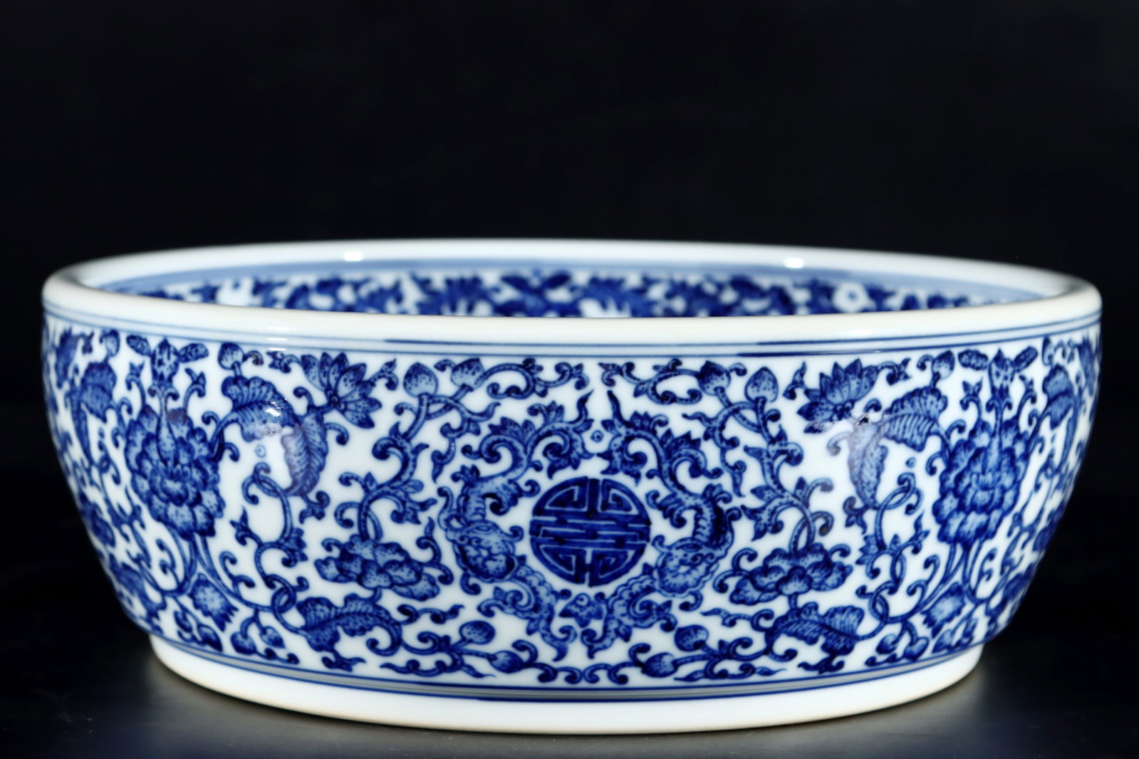 An Exquisite Blue and White Lotus Pattern Basin: An Exquisite Blue and White Lotus Pattern Basin,Qing Dynasty,China,Qianlong Six-character Mark,Size:4.1inx11.1in 青花缠枝莲纹盆,中国清ߣ