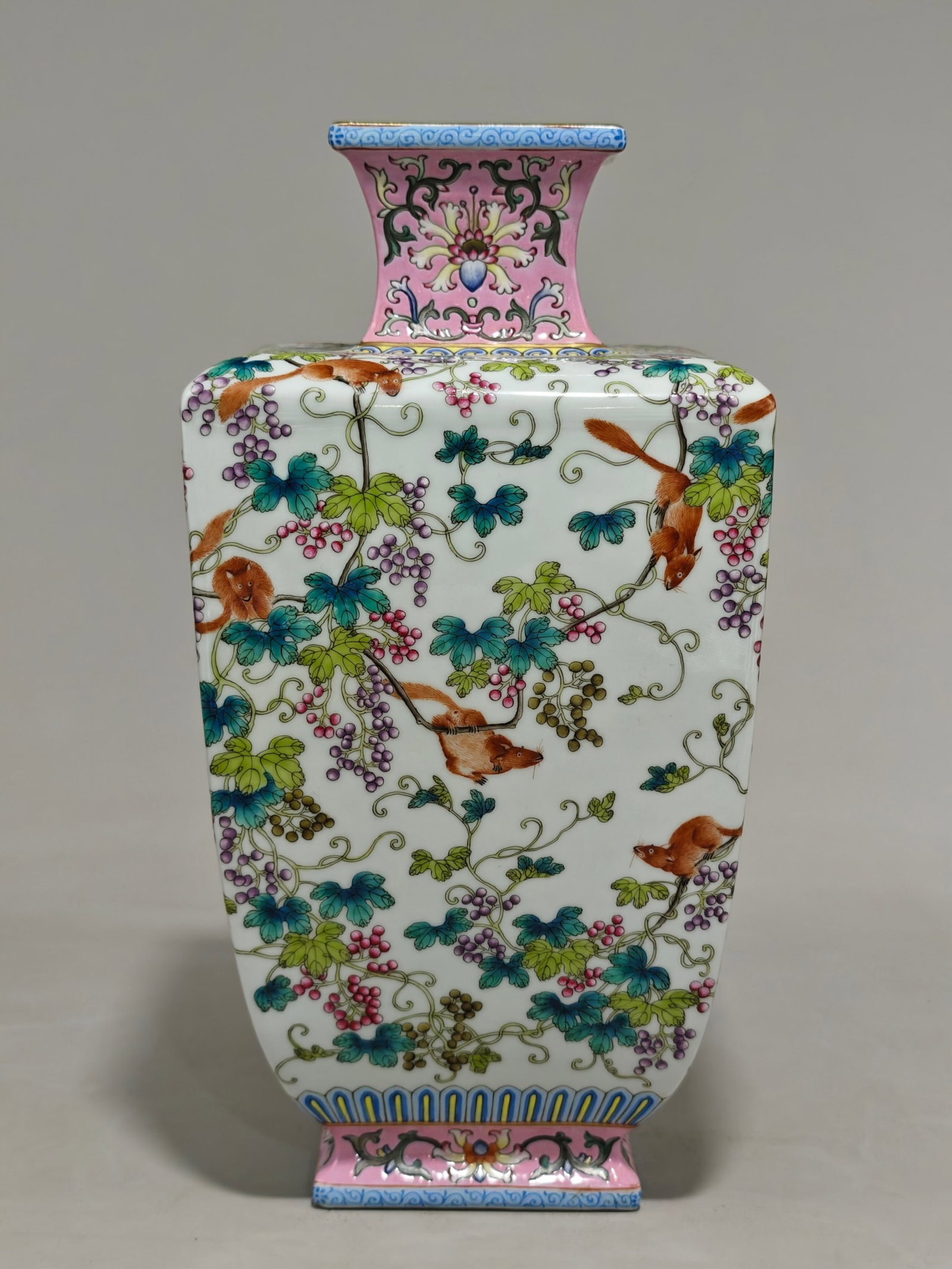 A Rare Famille-Rose Squirrel and Grapes Pattern Vase: A Rare Famille-Rose Squirrel and Grapes Pattern Vase,Qing Dynasty,China,Qianlong Six-character Mark,Size:12.2inx6.3in 粉彩松鼠葡萄纹瓶中国&#