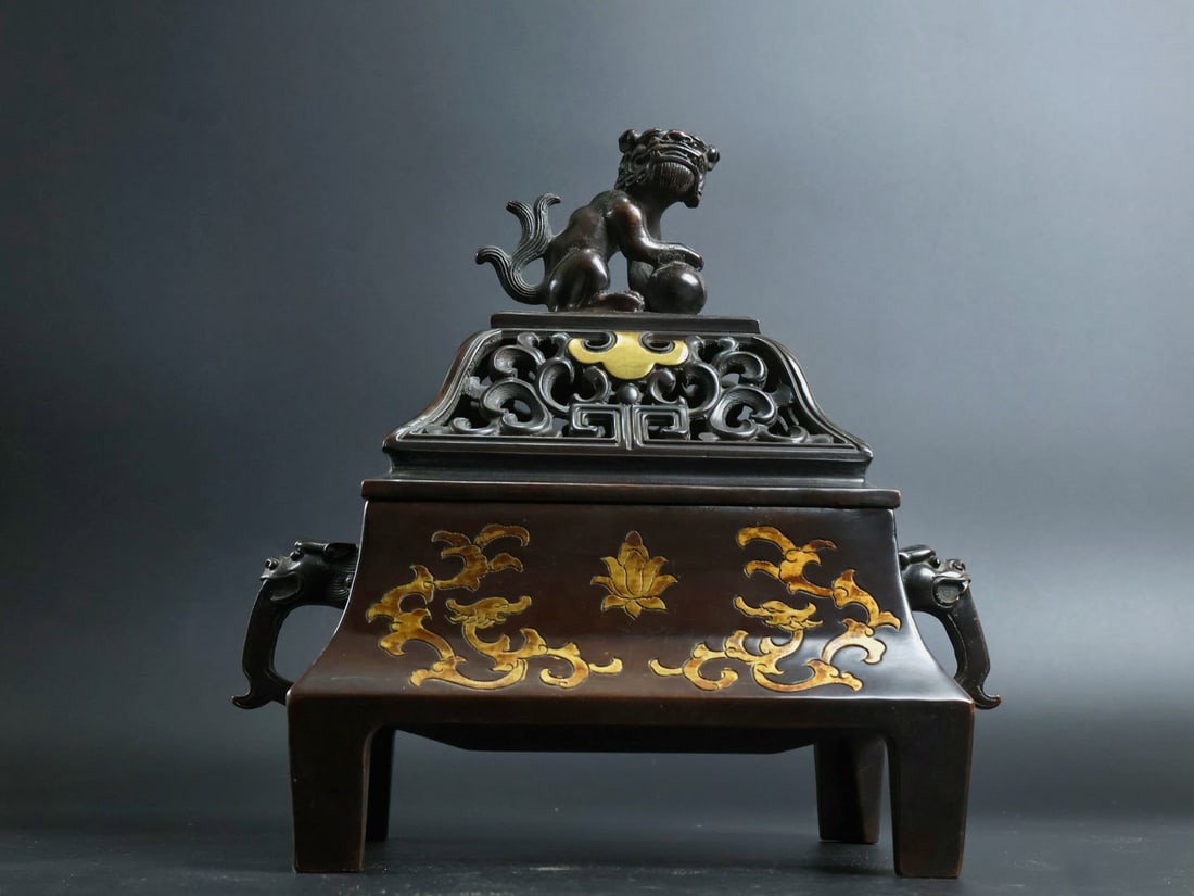 An Exquisite Gilt Bronze Flower and Dragon Pattern Double-Ears and Four-legs Censer: An Exquisite Gilt Bronze Flower and Dragon Pattern Double-Ears and Four-legs Censer,Ming Dynasty, China, Xuande Six-character Mark,Size:8.7inx5.8inx3.9in,Weight:5615g 铜鎏金花&